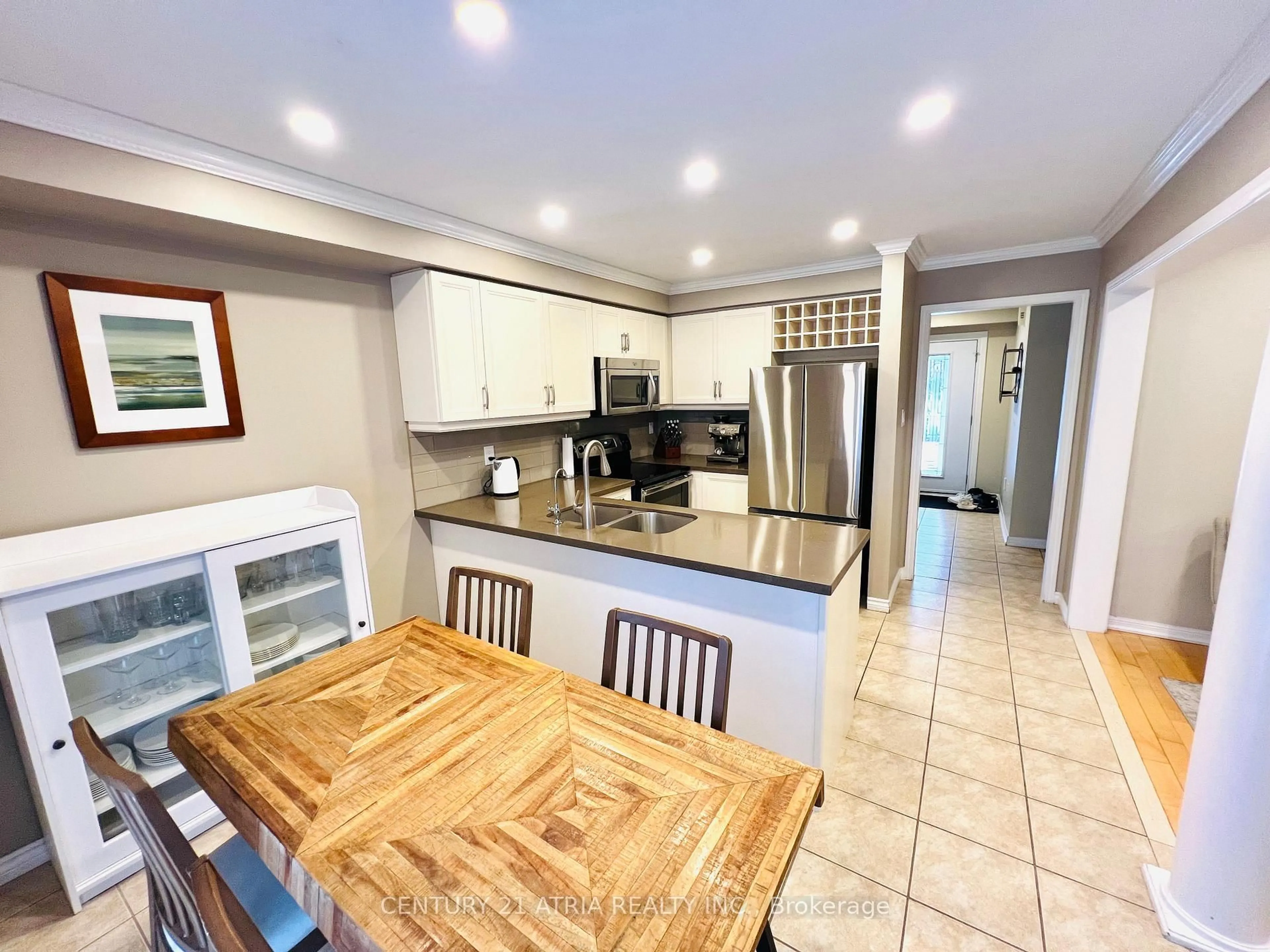Open concept kitchen, ceramic/tile floor for 19 Bird St, Barrie Ontario L4N 0X4