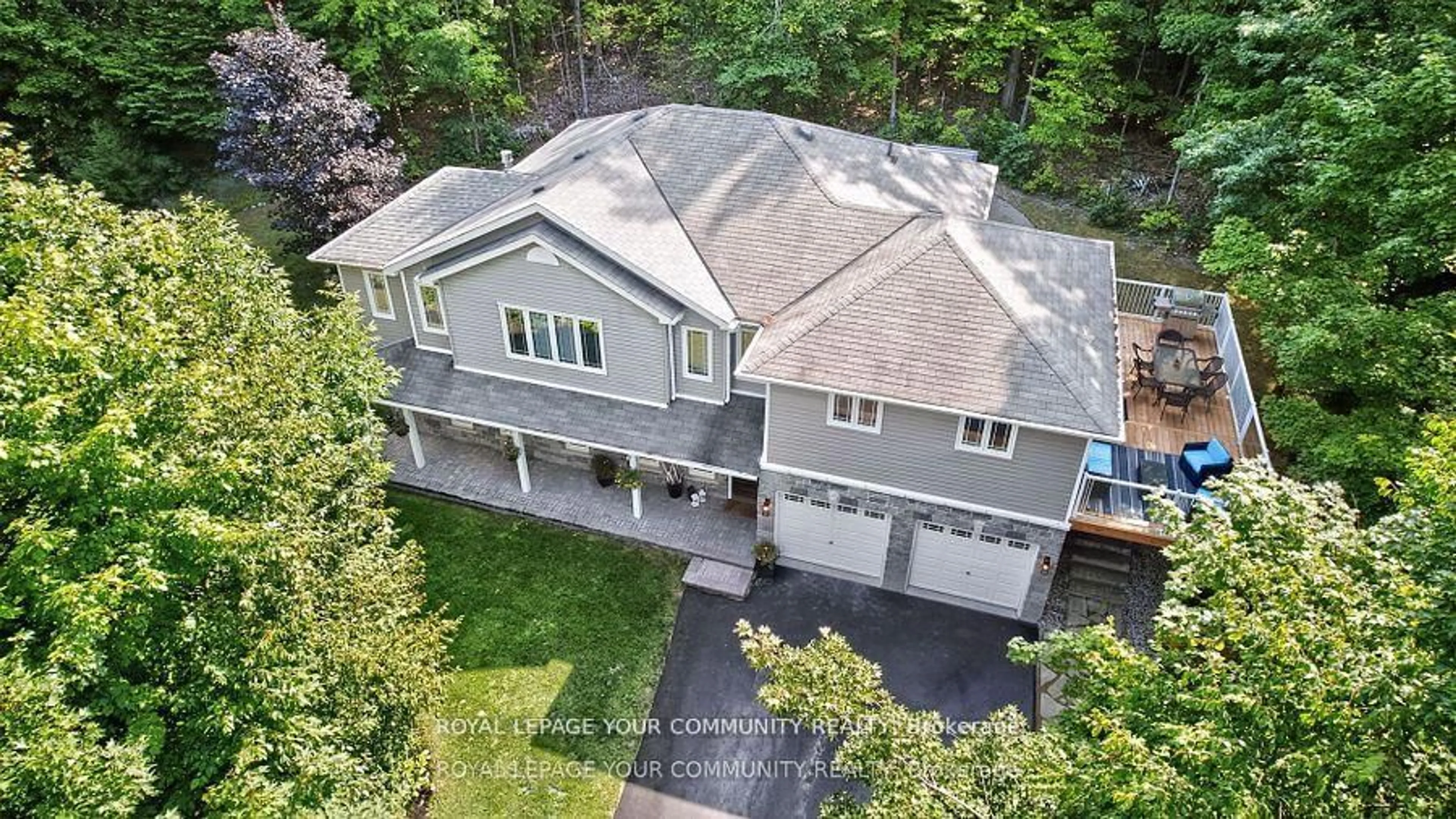 A pic from outside/outdoor area/front of a property/back of a property/a pic from drone, unknown for 135 Huronwoods Dr, Oro-Medonte Ontario L0K 1E0