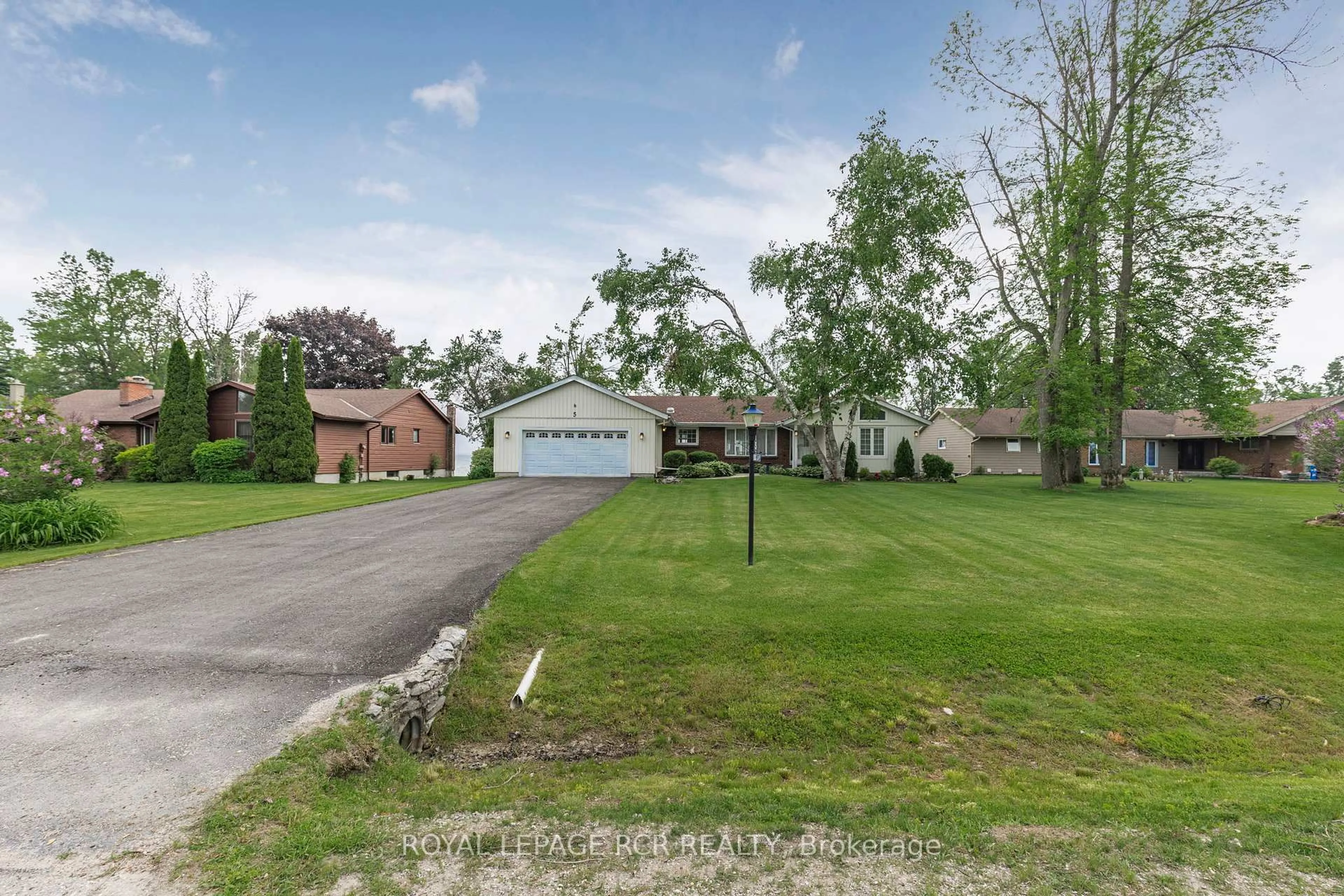 A pic from outside/outdoor area/front of a property/back of a property/a pic from drone, street for 5 Park Lane, Ramara Ontario L0K 1B0