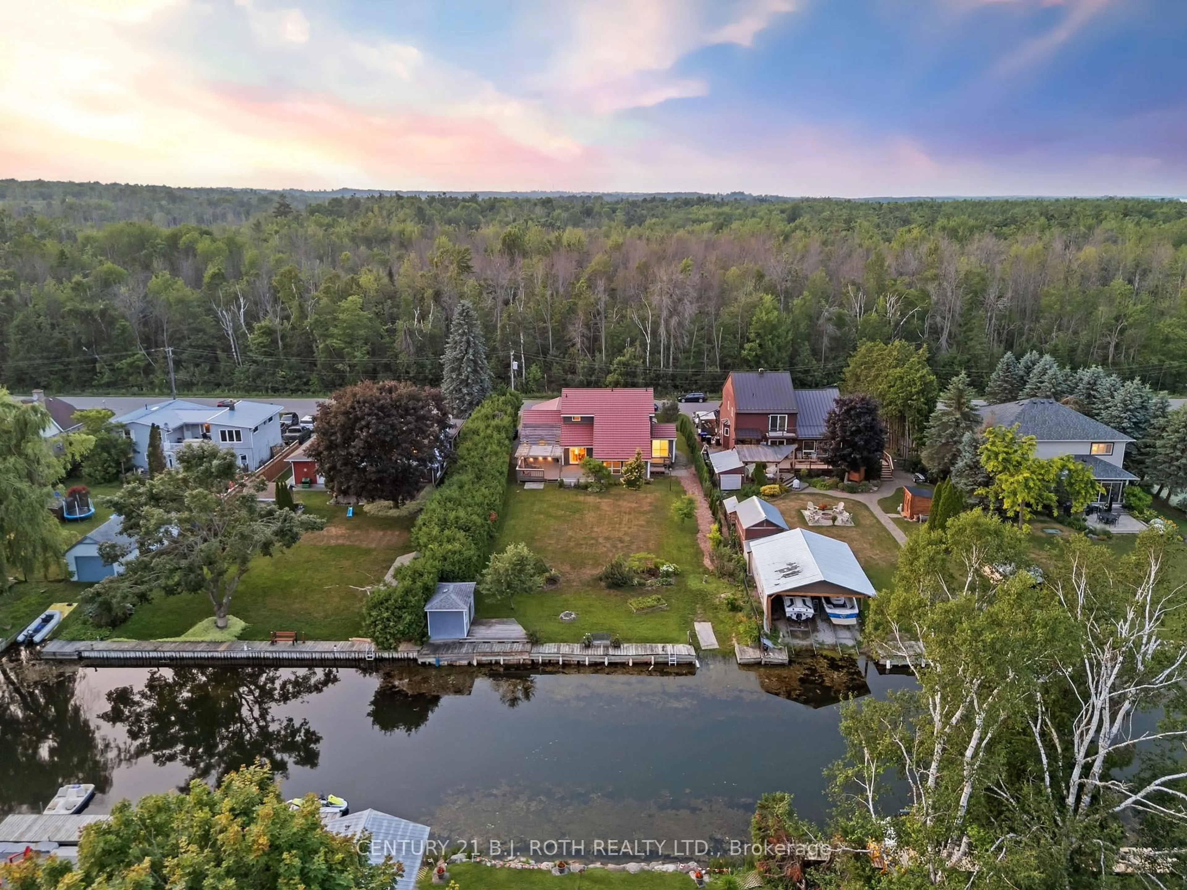 A pic from outside/outdoor area/front of a property/back of a property/a pic from drone, water/lake/river/ocean view for 1415 Cunningham Cres, Severn Ontario L3V 7E1