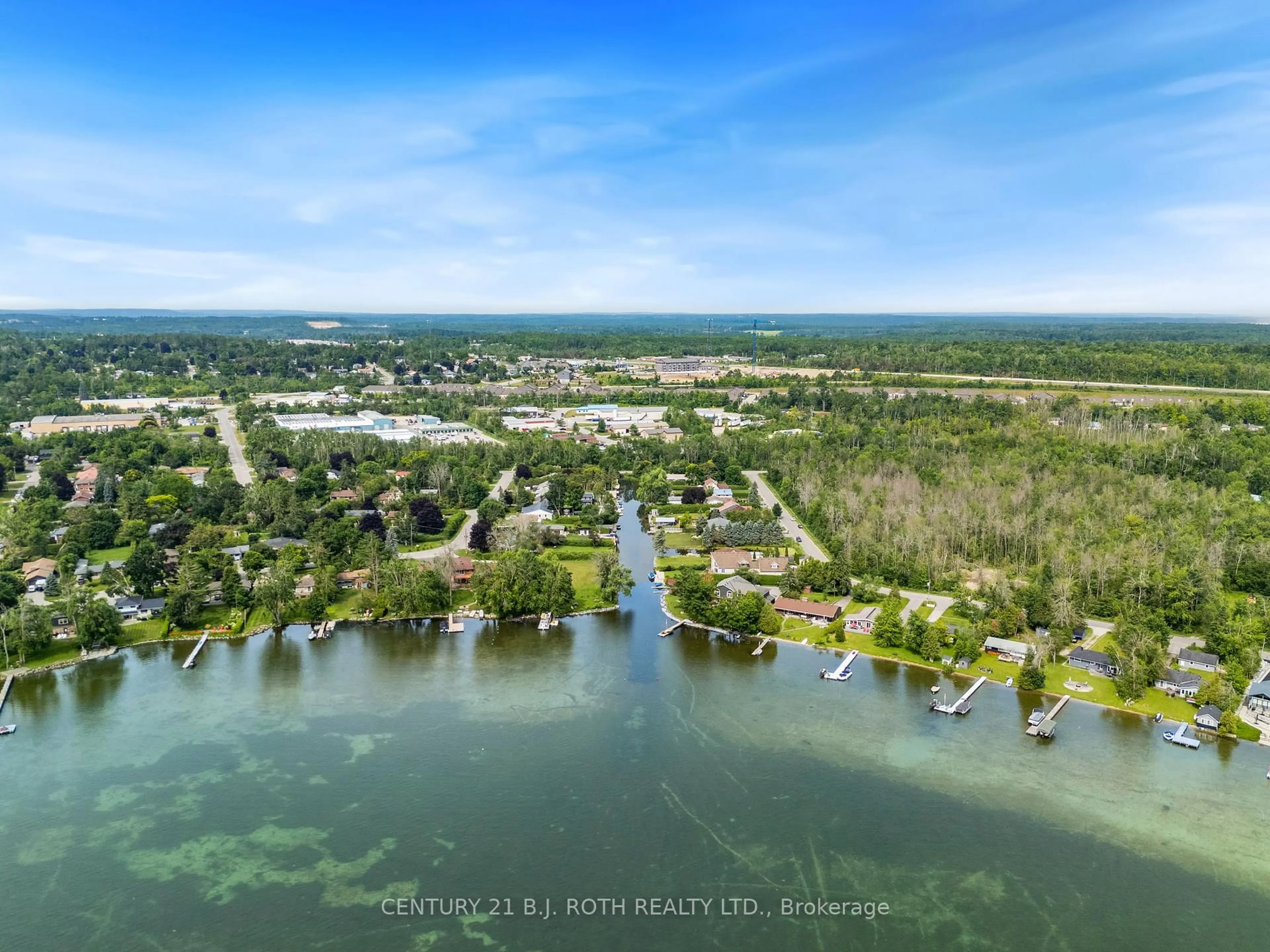 A pic from outside/outdoor area/front of a property/back of a property/a pic from drone, water/lake/river/ocean view for 1415 Cunningham Cres, Severn Ontario L3V 7E1
