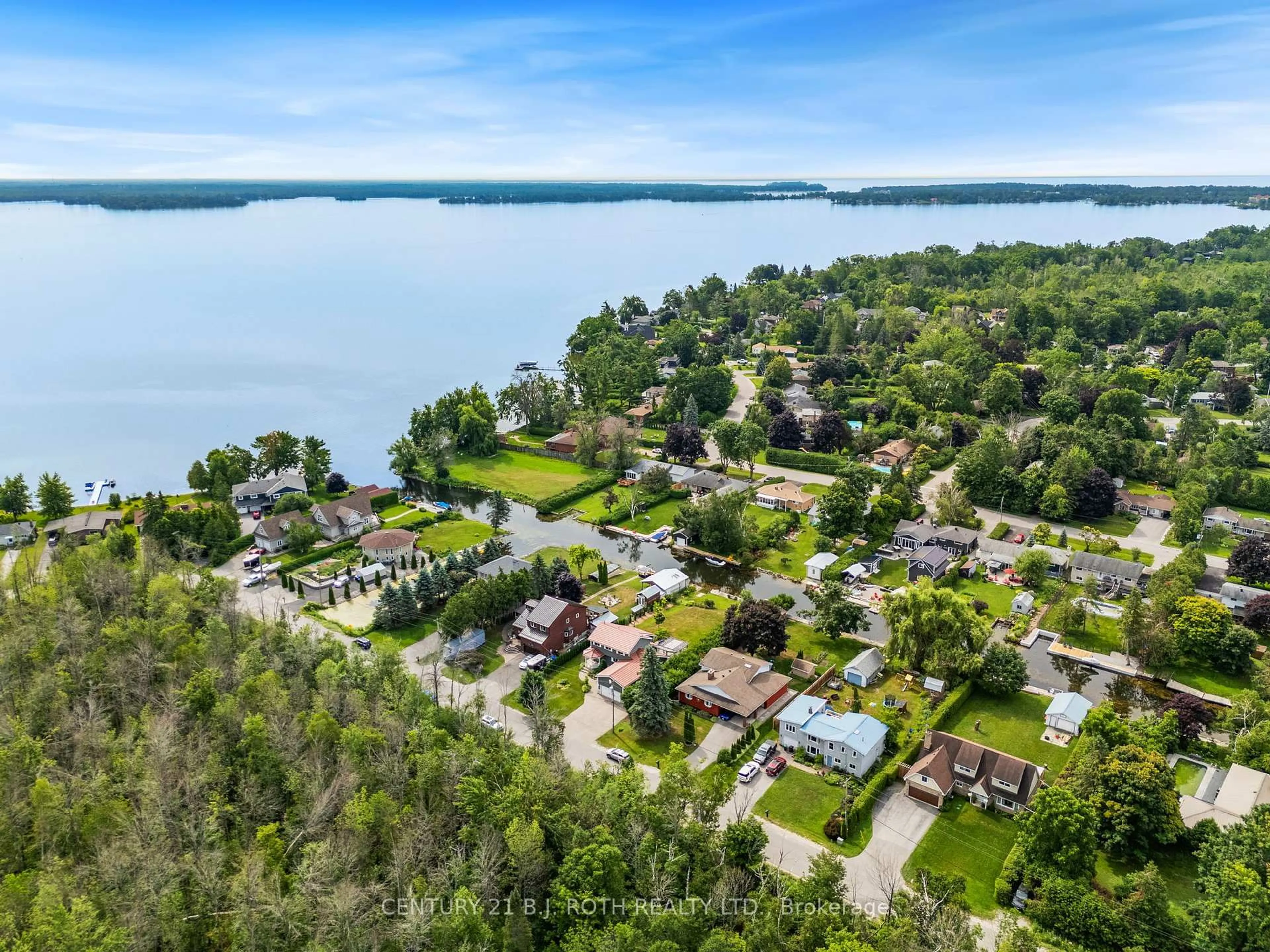 A pic from outside/outdoor area/front of a property/back of a property/a pic from drone, water/lake/river/ocean view for 1415 Cunningham Cres, Severn Ontario L3V 7E1