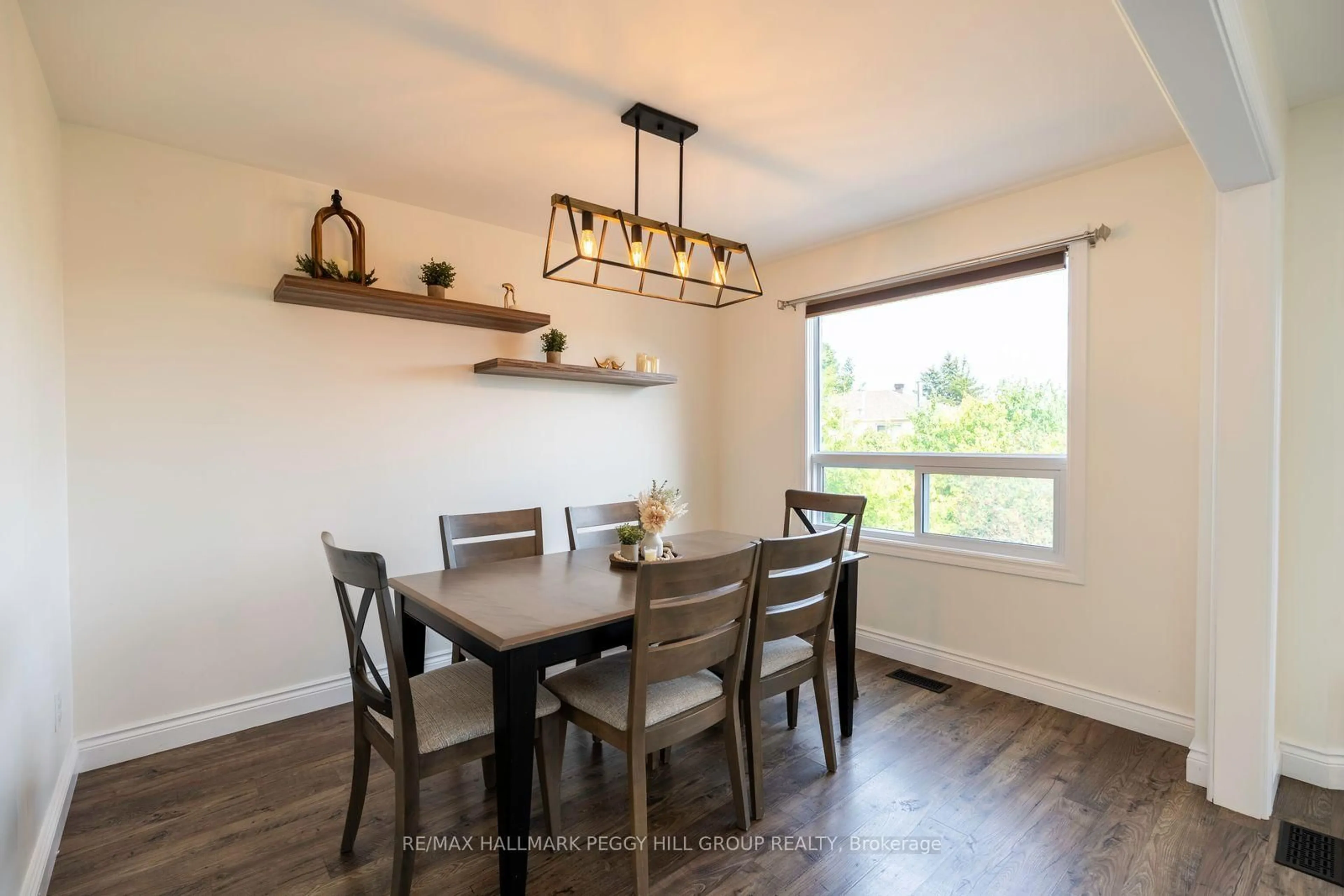 Dining room, wood/laminate floor for 12 Cuthbert St, Barrie Ontario L4N 6X7