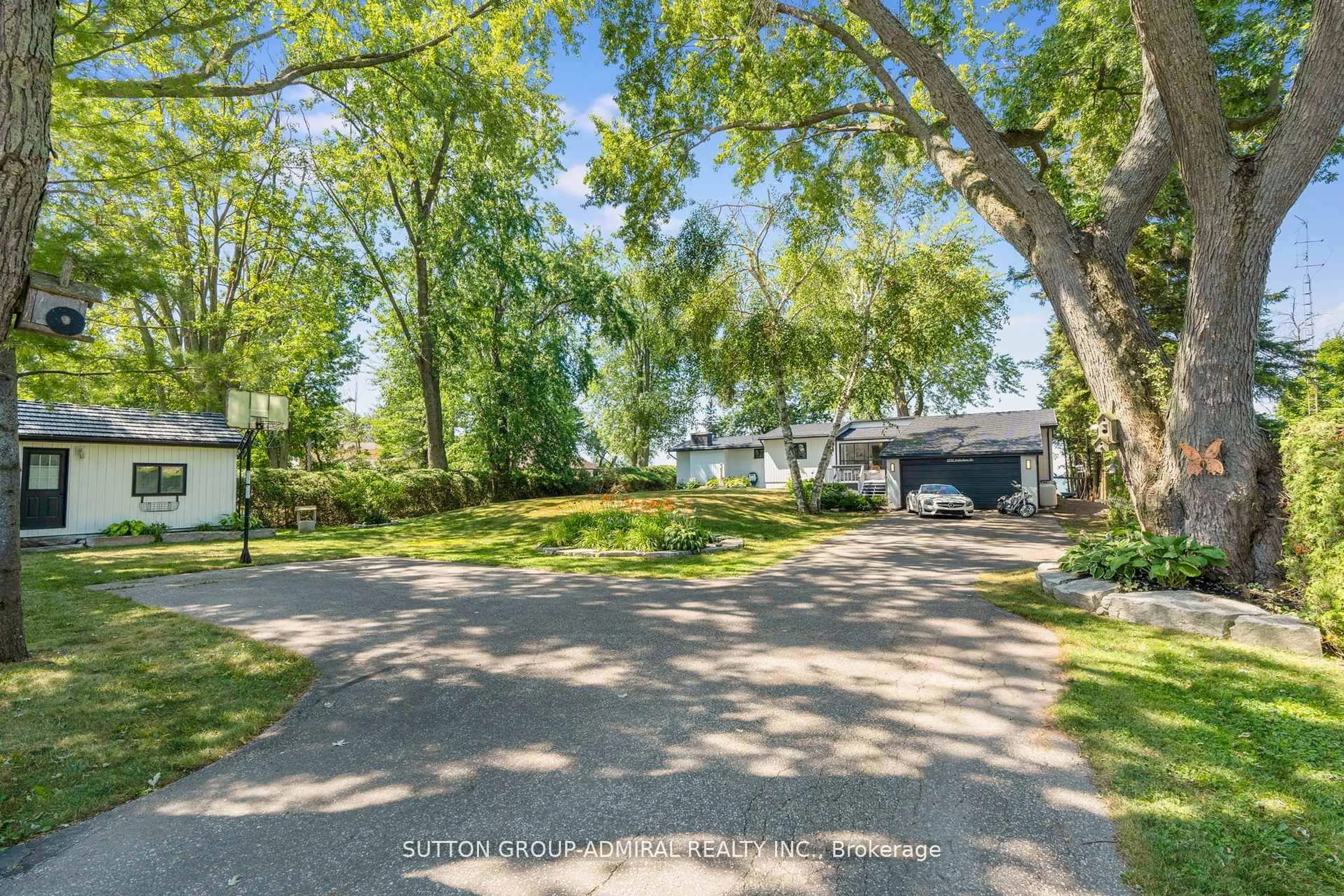 A pic from outside/outdoor area/front of a property/back of a property/a pic from drone, street for 2232 Lakeshore Dr, Ramara Ontario L0K 1B0