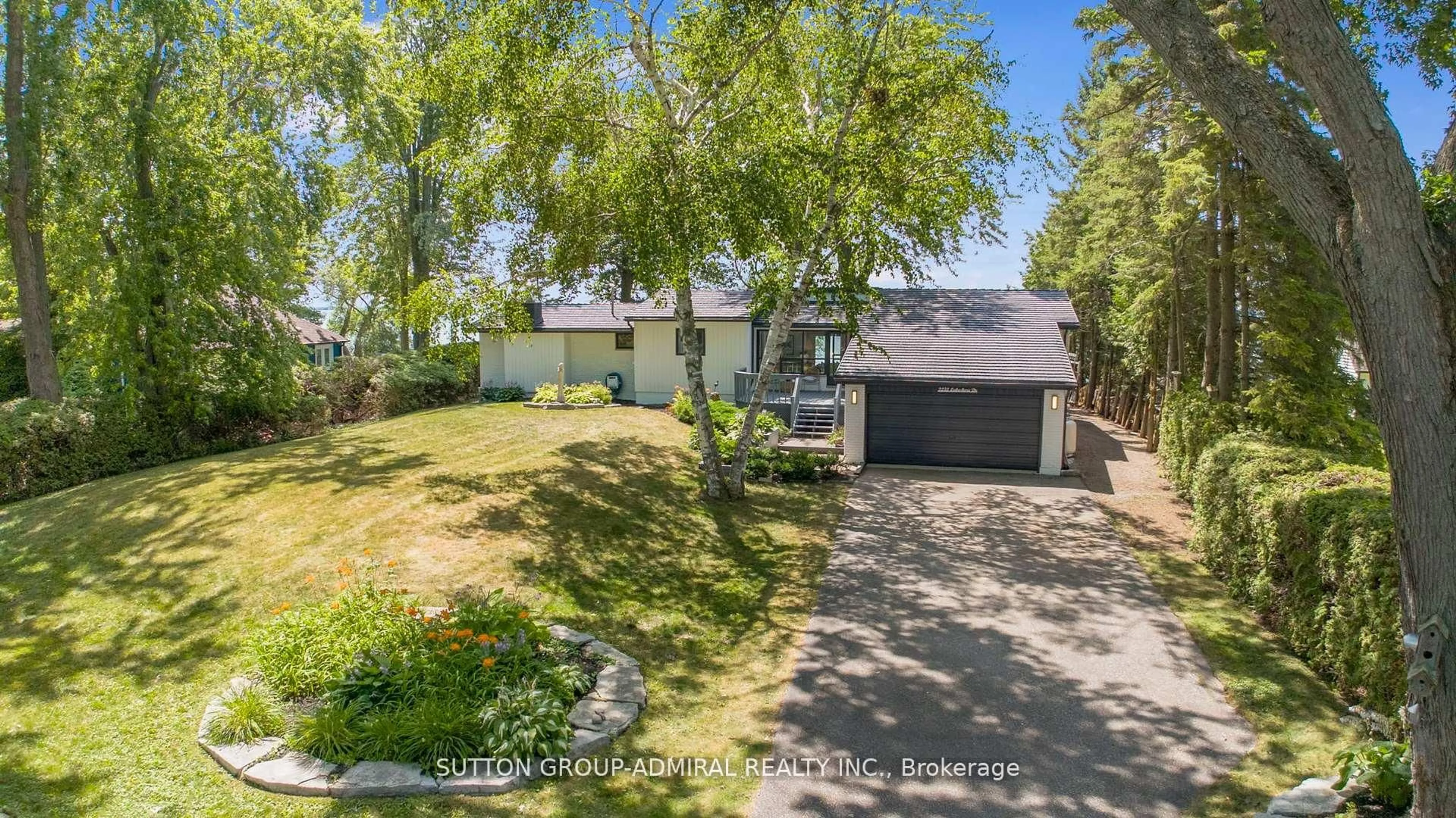 A pic from outside/outdoor area/front of a property/back of a property/a pic from drone, street for 2232 Lakeshore Dr, Ramara Ontario L0K 1B0