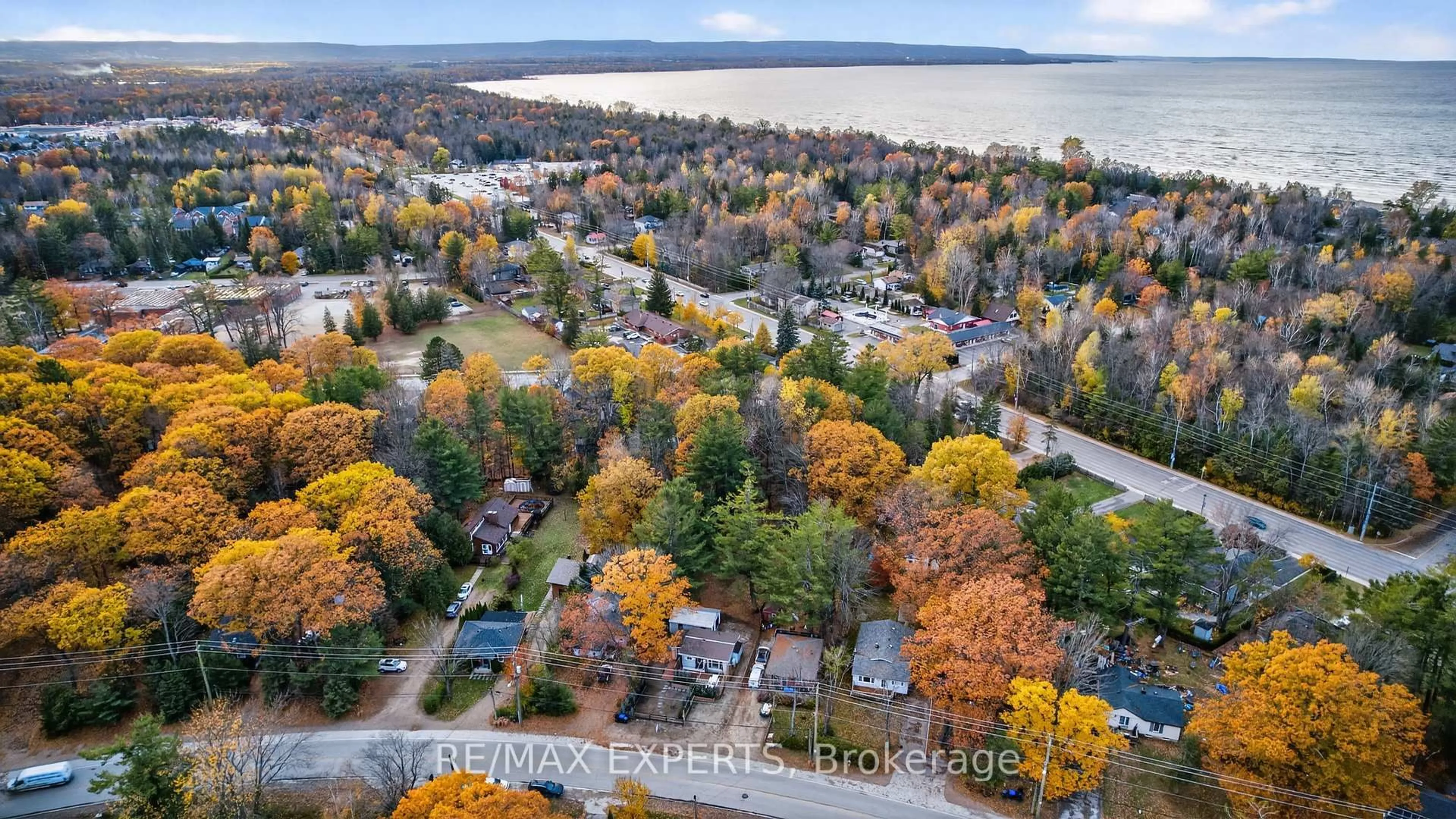 A pic from outside/outdoor area/front of a property/back of a property/a pic from drone, water/lake/river/ocean view for 48 Sunnidale Rd, Wasaga Beach Ontario L9Z 2M5