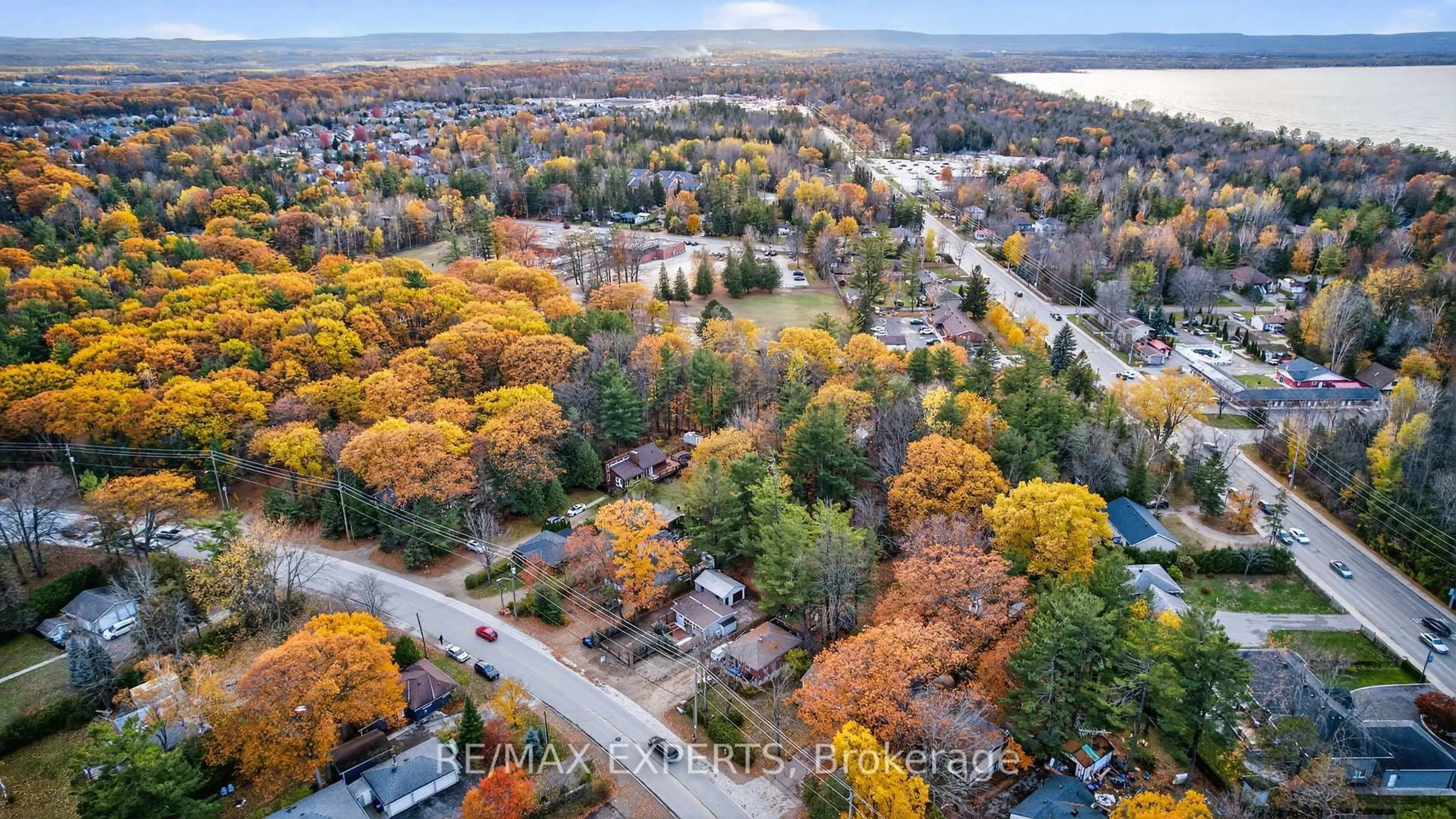 A pic from outside/outdoor area/front of a property/back of a property/a pic from drone, forest/trees view for 48 Sunnidale Rd, Wasaga Beach Ontario L9Z 2M5