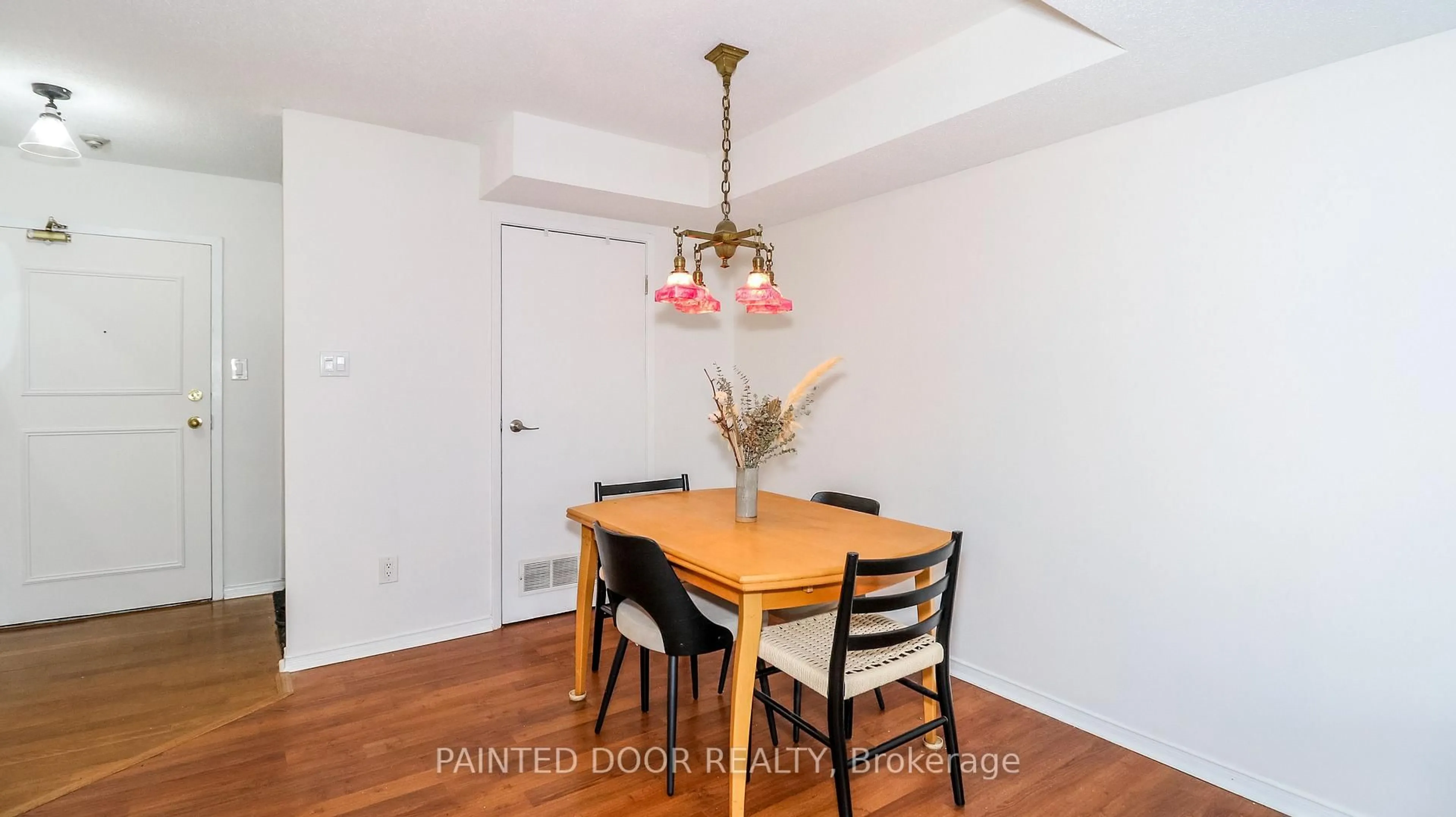 Dining room, wood/laminate floor for 126 Bell Farm Rd #113, Barrie Ontario L4M 6J3