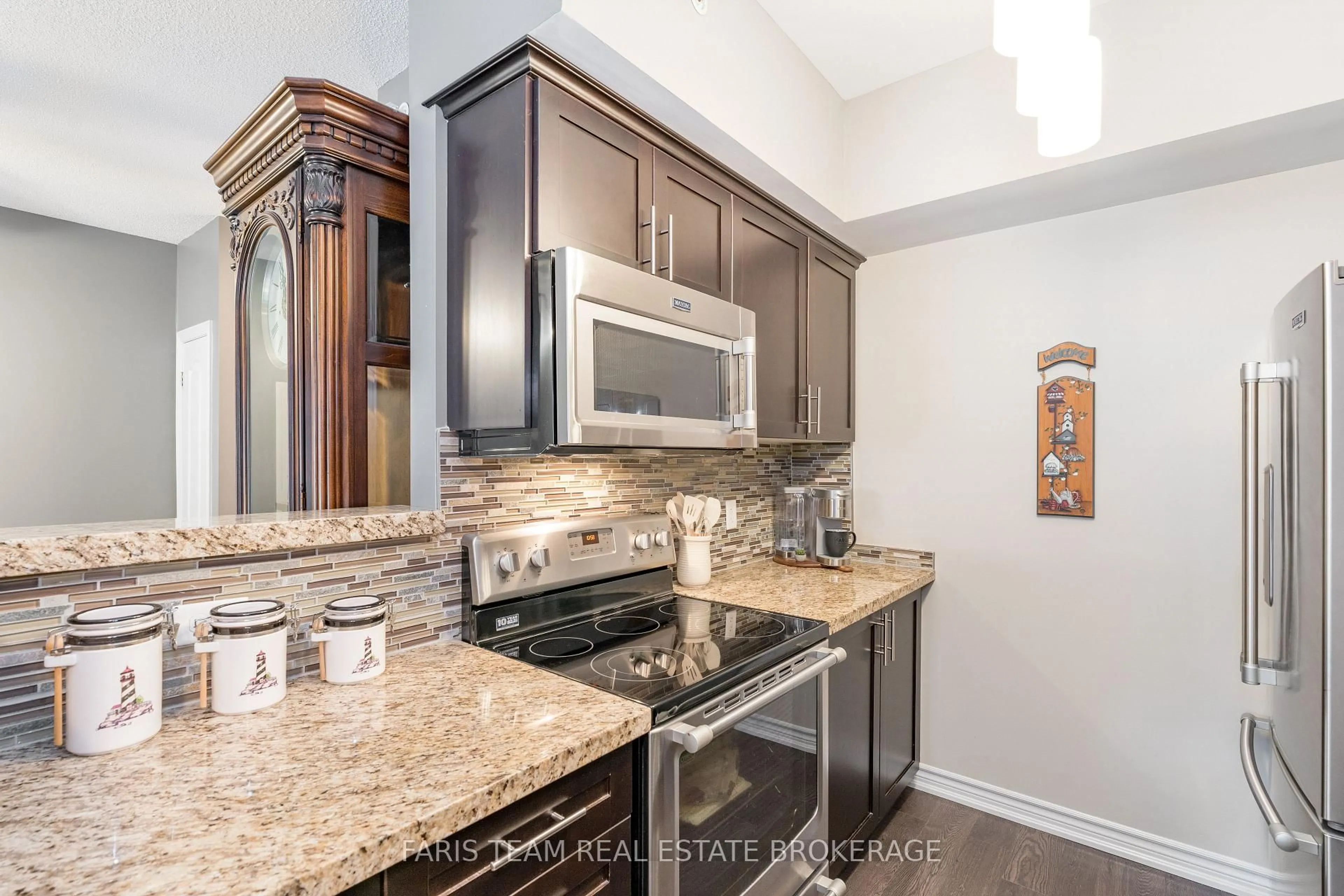 Open concept kitchen, ceramic/tile floor for 40 Ferndale Dr #210, Barrie Ontario L4N 2L3