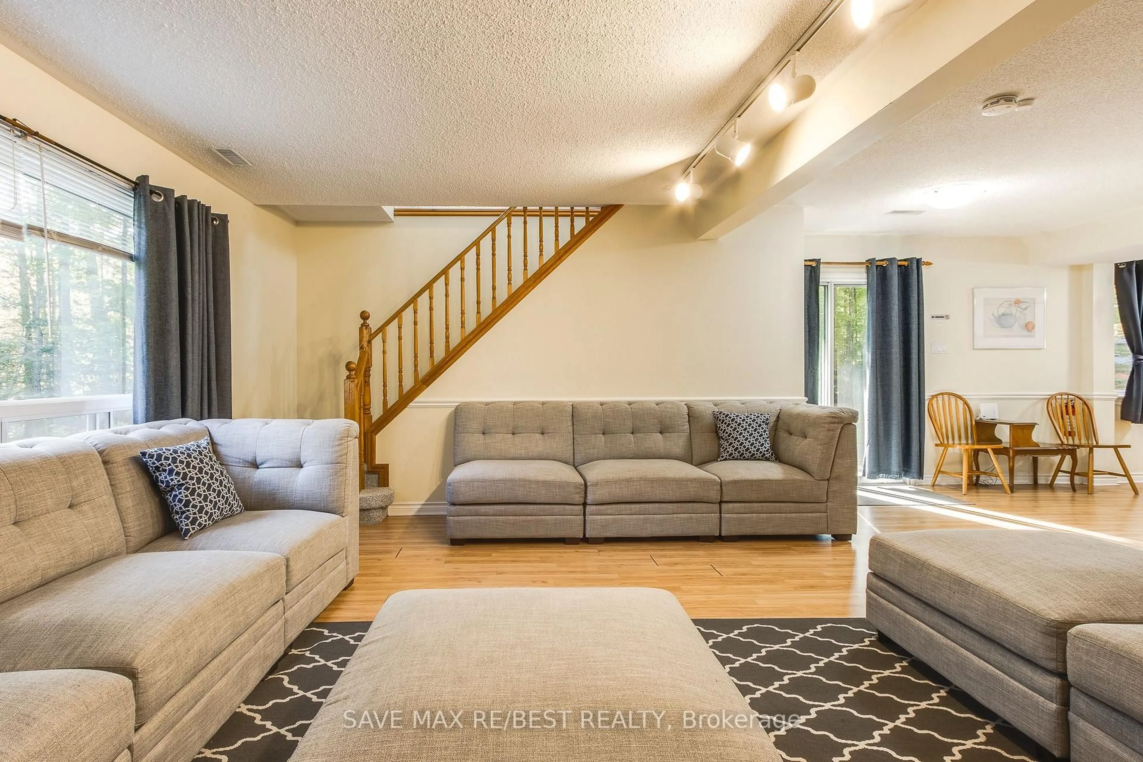 Living room with furniture, unknown for 910 Concession Rd 17, Penetanguishene Ontario L9M 1R3