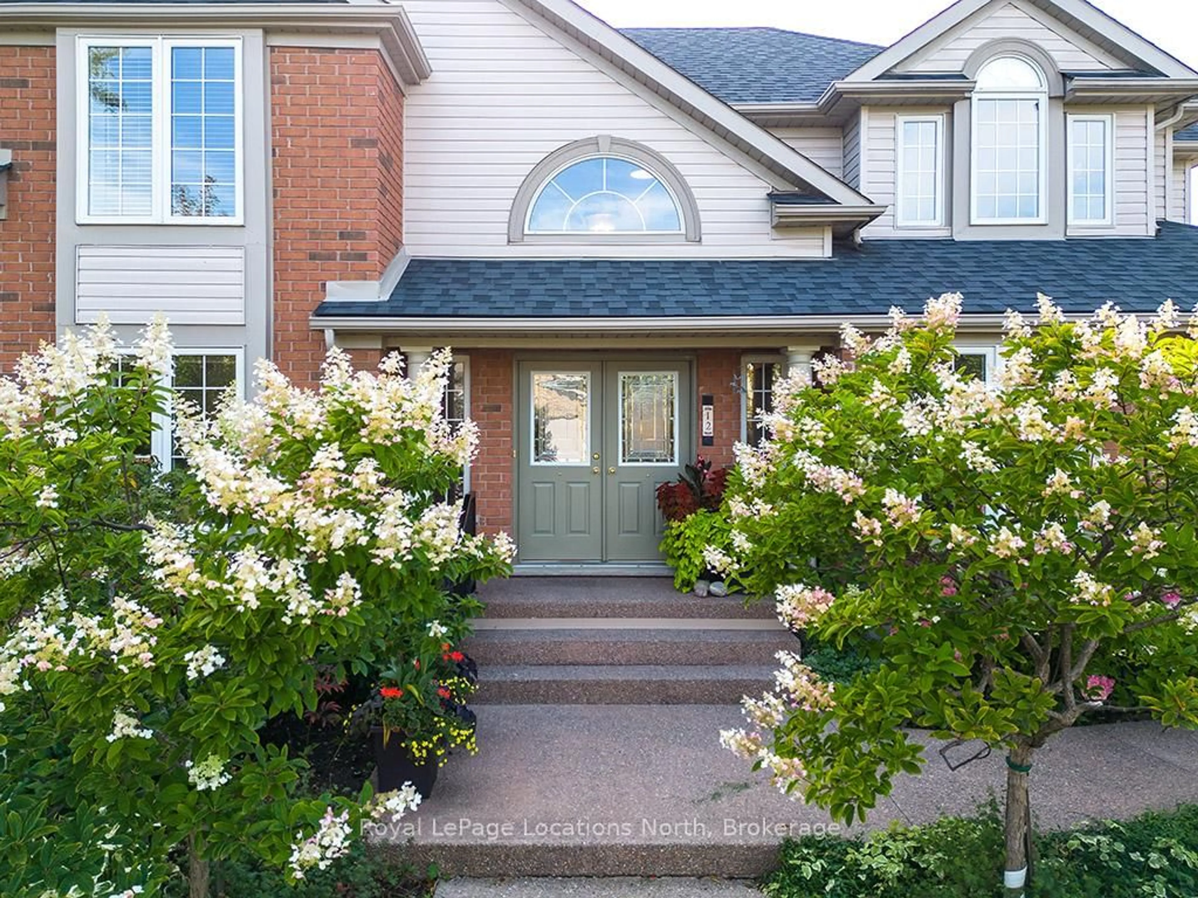 Home with brick exterior material, street for 12 Georgian Meadows Dr, Collingwood Ontario L9Y 5G9