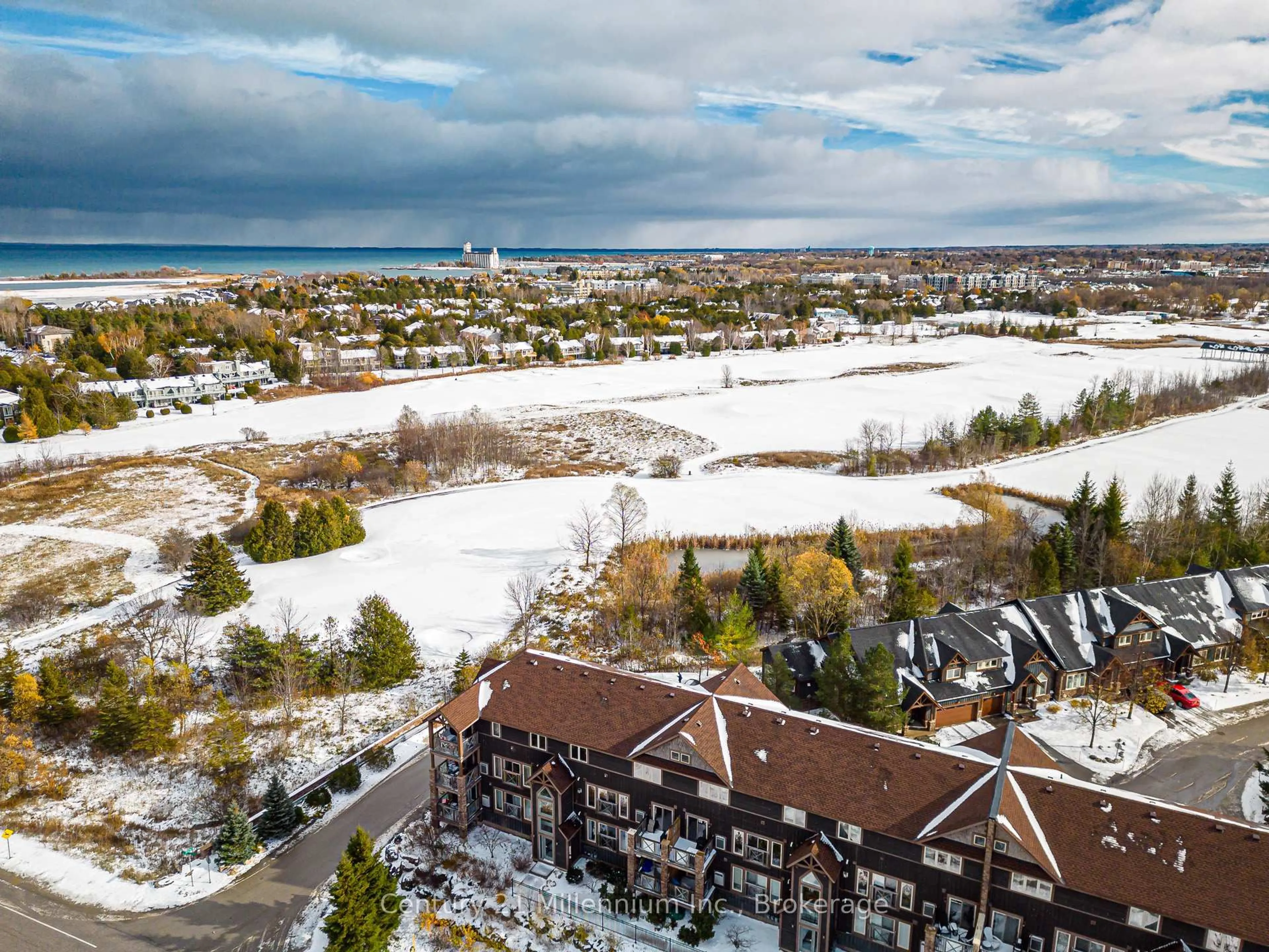 A pic from outside/outdoor area/front of a property/back of a property/a pic from drone, water/lake/river/ocean view for 6 Joseph Tr #201, Collingwood Ontario L9Y 0J2