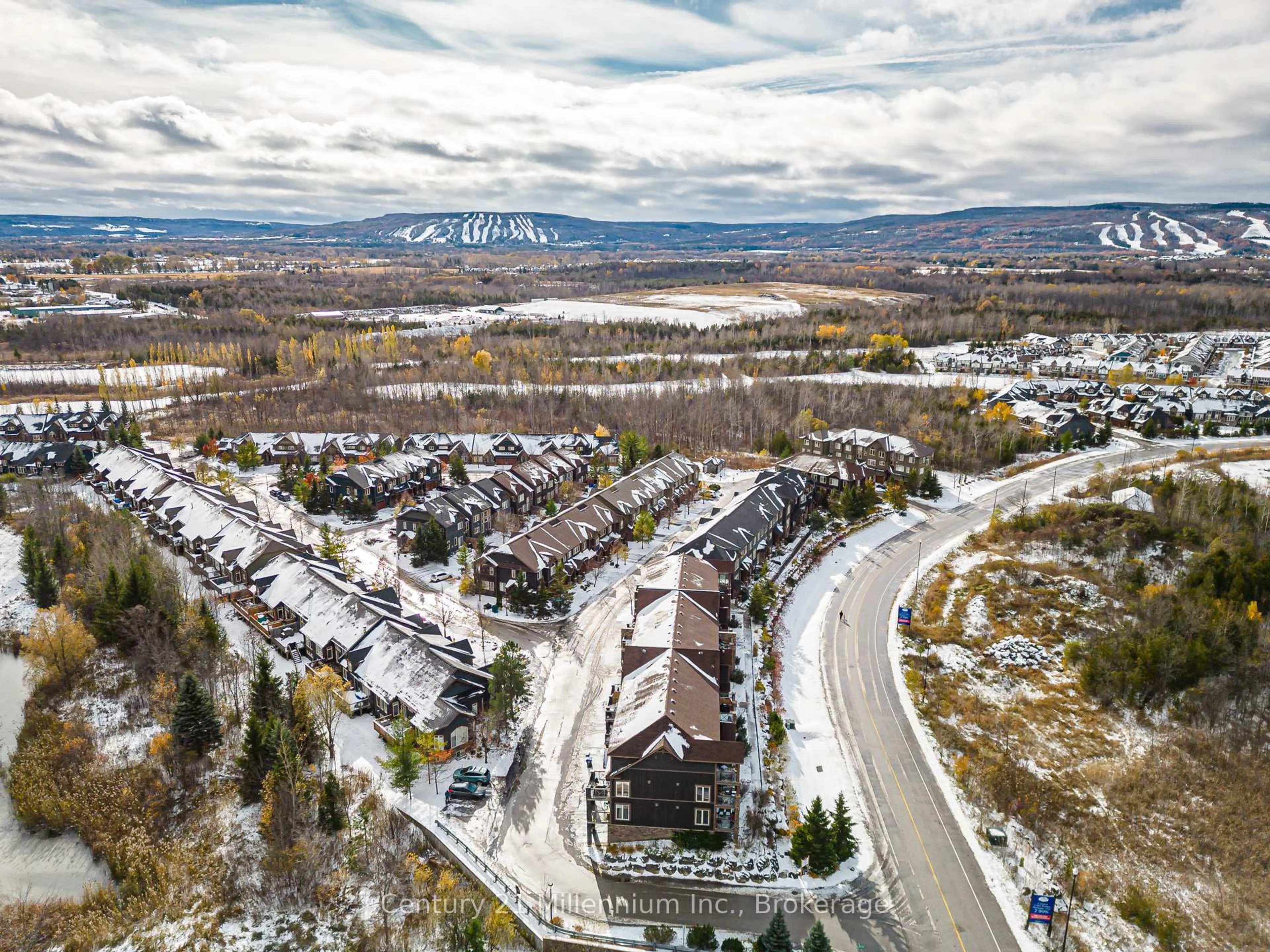 A pic from outside/outdoor area/front of a property/back of a property/a pic from drone, mountain view for 6 Joseph Tr #201, Collingwood Ontario L9Y 0J2