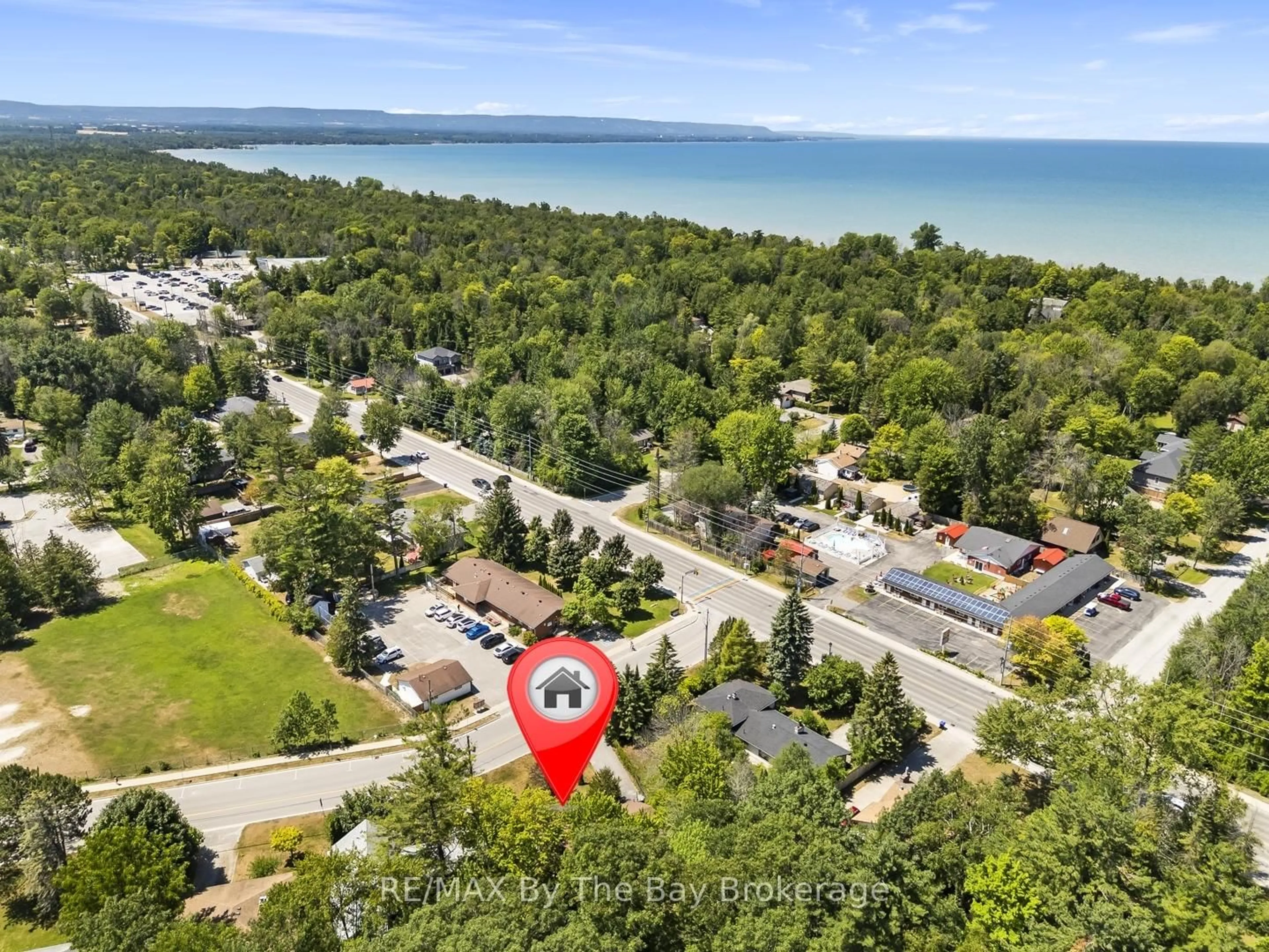 A pic from outside/outdoor area/front of a property/back of a property/a pic from drone, water/lake/river/ocean view for 11 39th St, Wasaga Beach Ontario L9Z 1S2