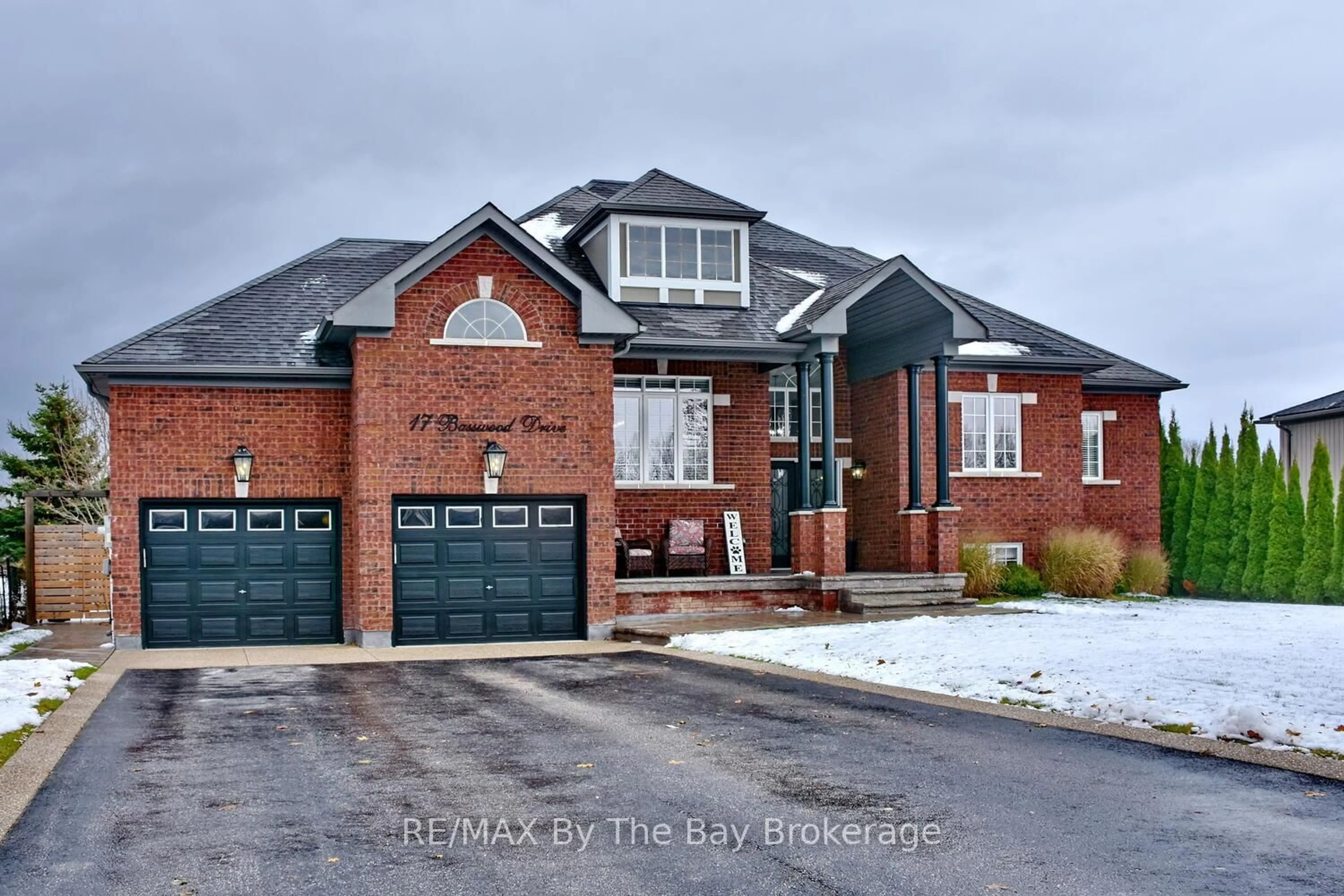 Home with brick exterior material, street for 17 Basswood Dr, Wasaga Beach Ontario L9Z 0A8