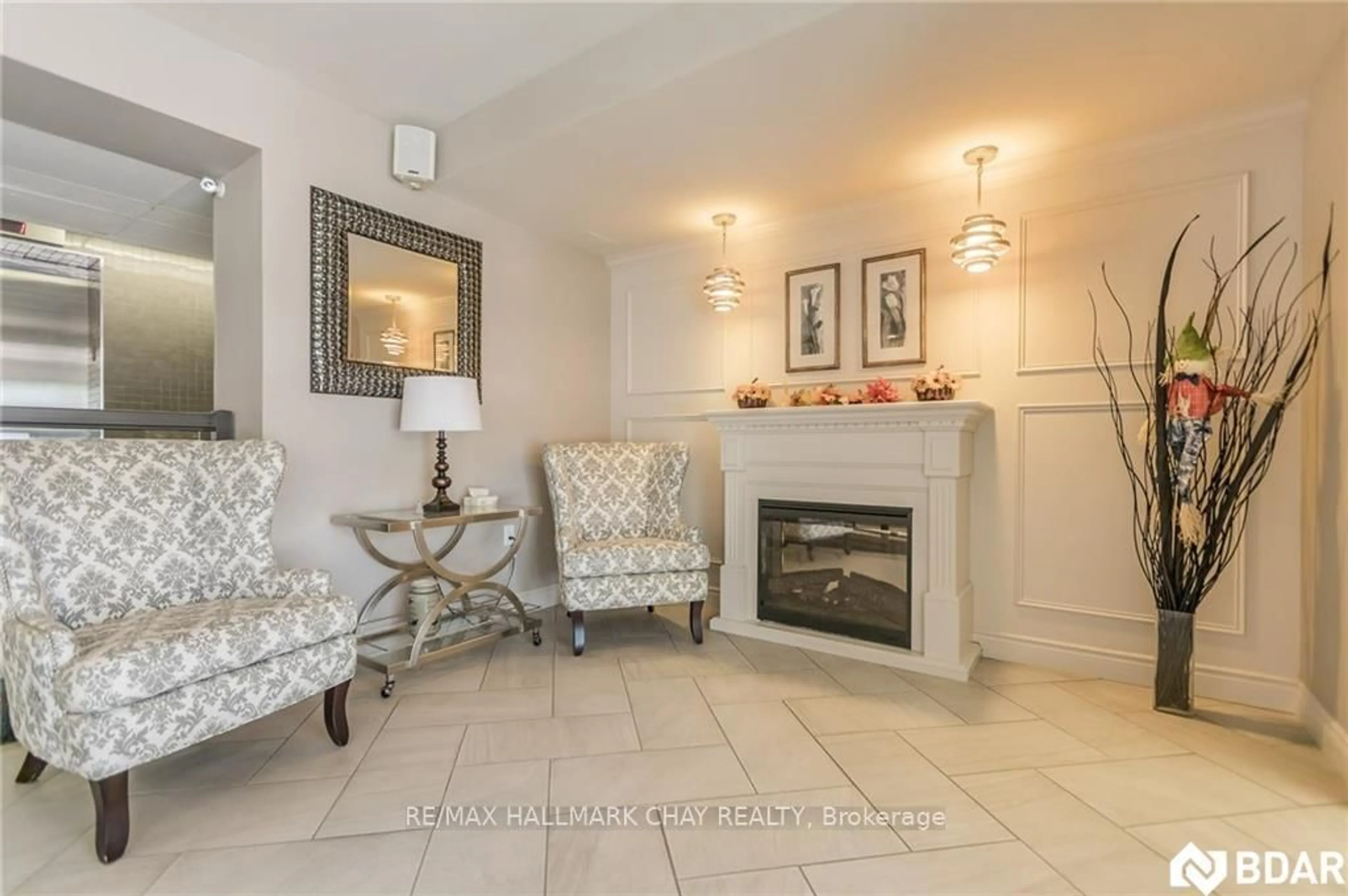 Living room with furniture, ceramic/tile floor for 414 Blake St #706, Barrie Ontario L4M 5J7