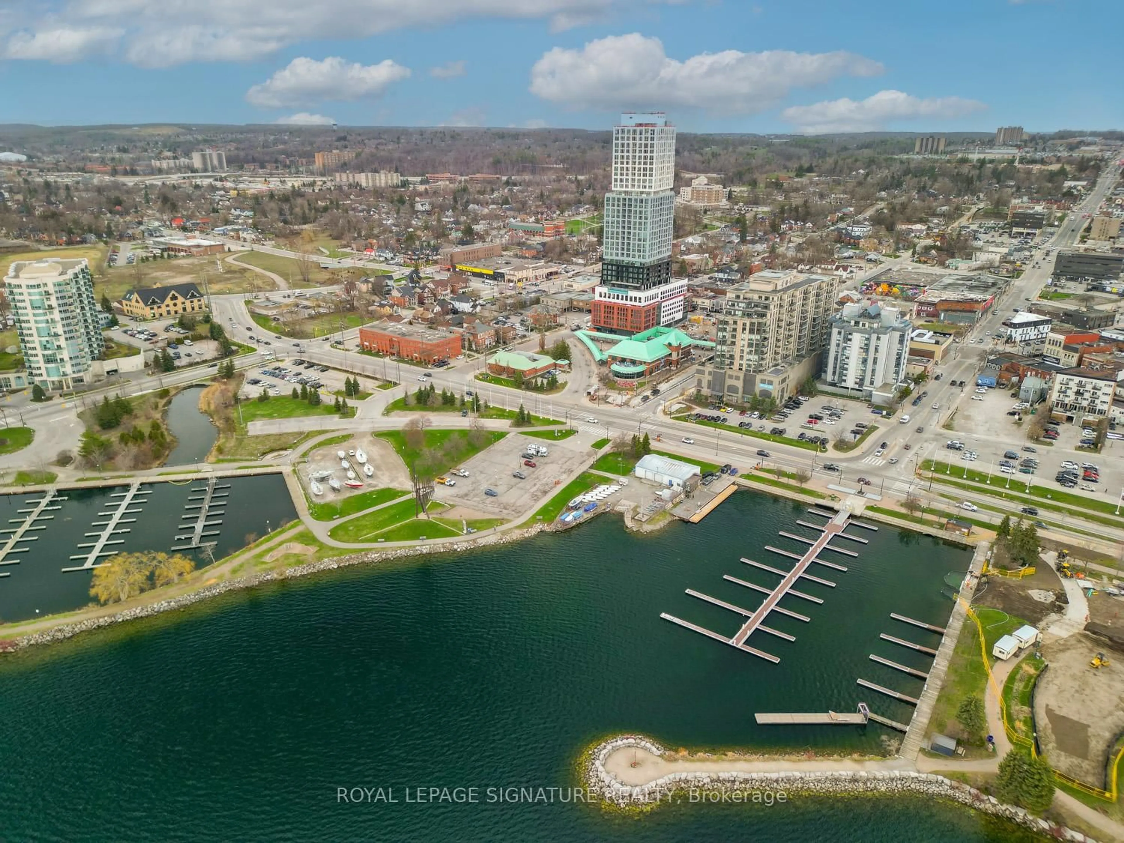 A pic from outside/outdoor area/front of a property/back of a property/a pic from drone, water/lake/river/ocean view for 39 Mary St #2201, Barrie Ontario L4N 1S9