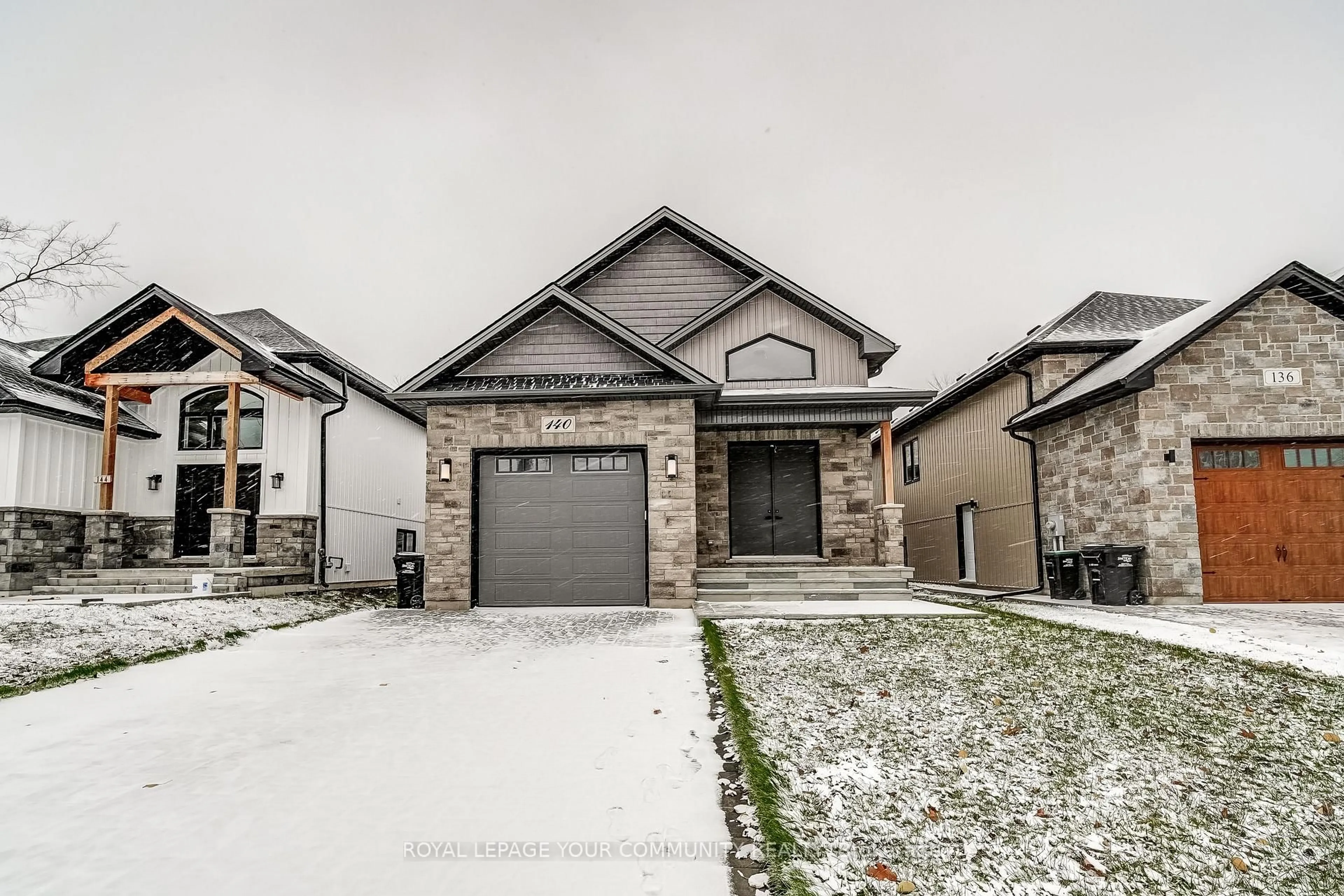 Home with brick exterior material, street for 140 58TH St, Wasaga Beach Ontario L9Z 2Z1