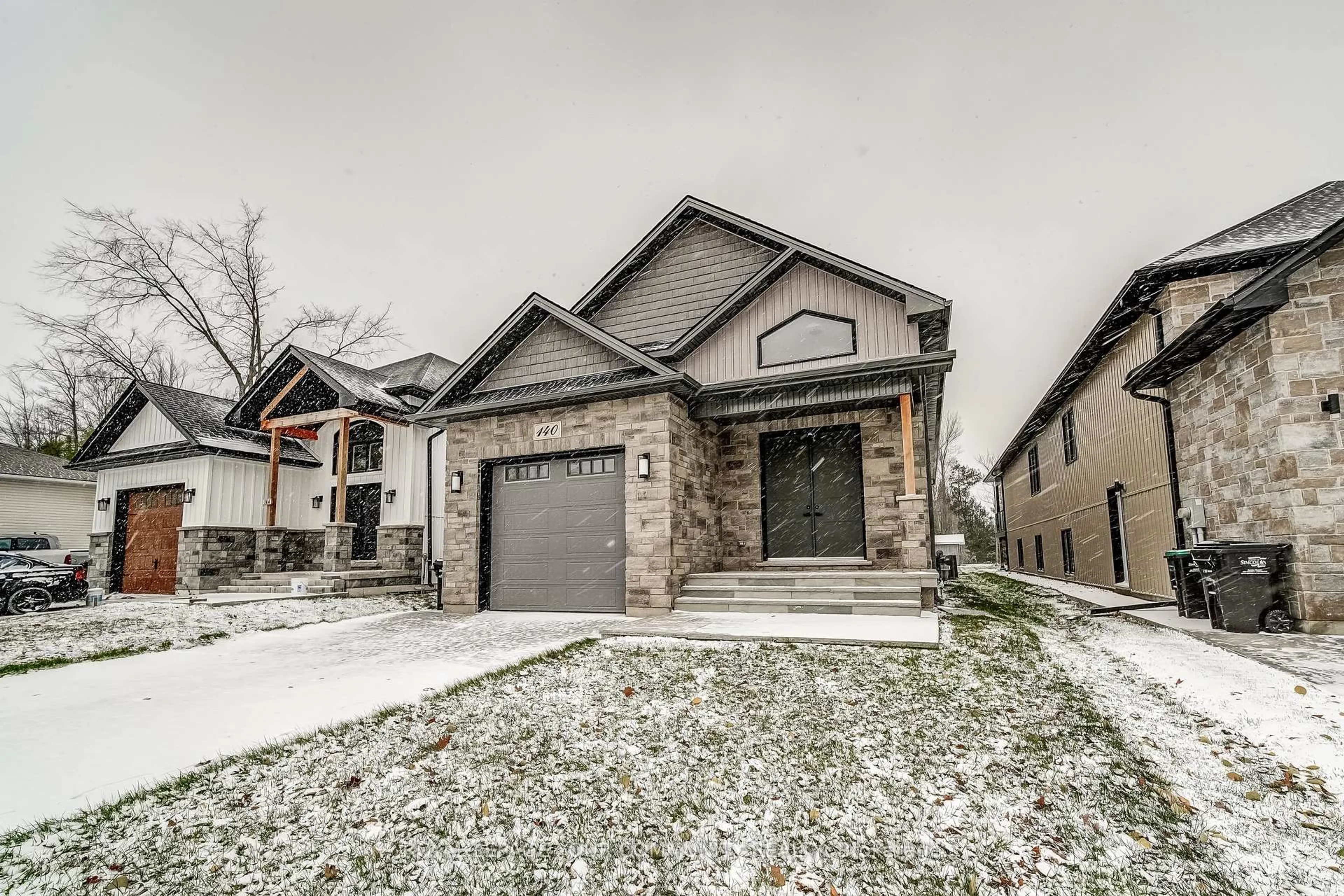 Home with brick exterior material, street for 140 58TH St, Wasaga Beach Ontario L9Z 2Z1