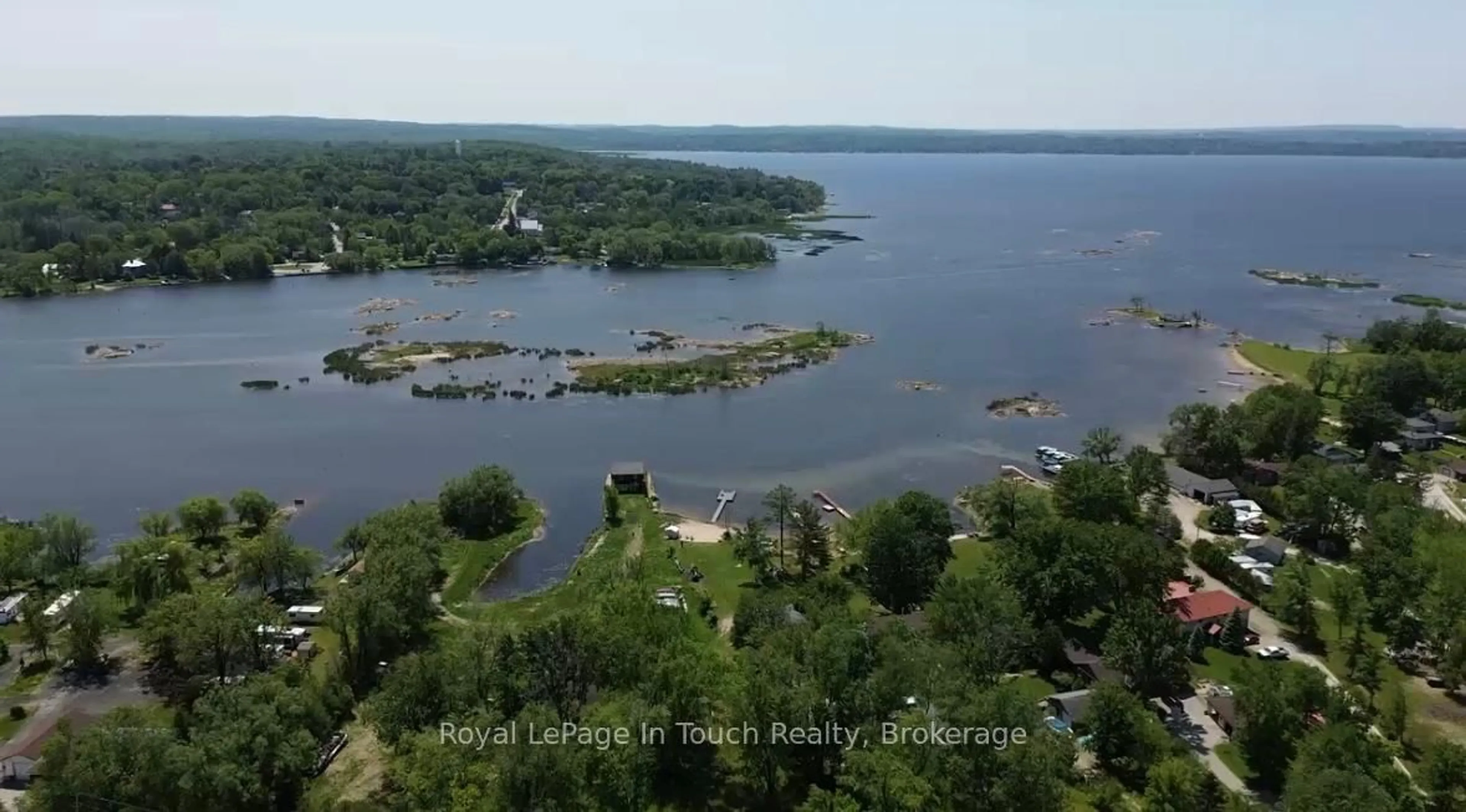 A pic from outside/outdoor area/front of a property/back of a property/a pic from drone, water/lake/river/ocean view for 164 Duck Bay Rd, Tay Ontario L0K 2C0