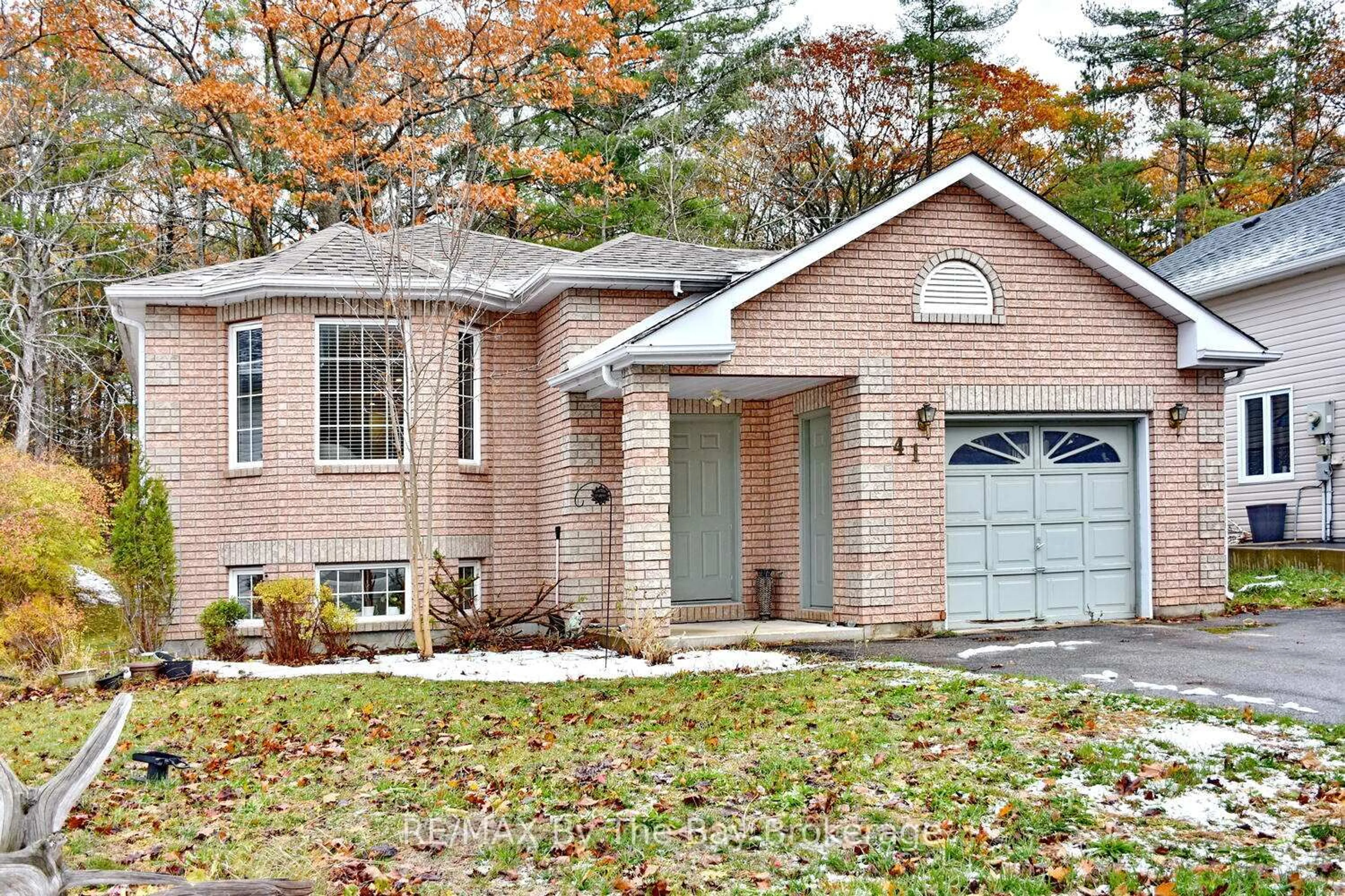 Home with brick exterior material, street for 41 Wesley Ave, Wasaga Beach Ontario L9Z 1C8