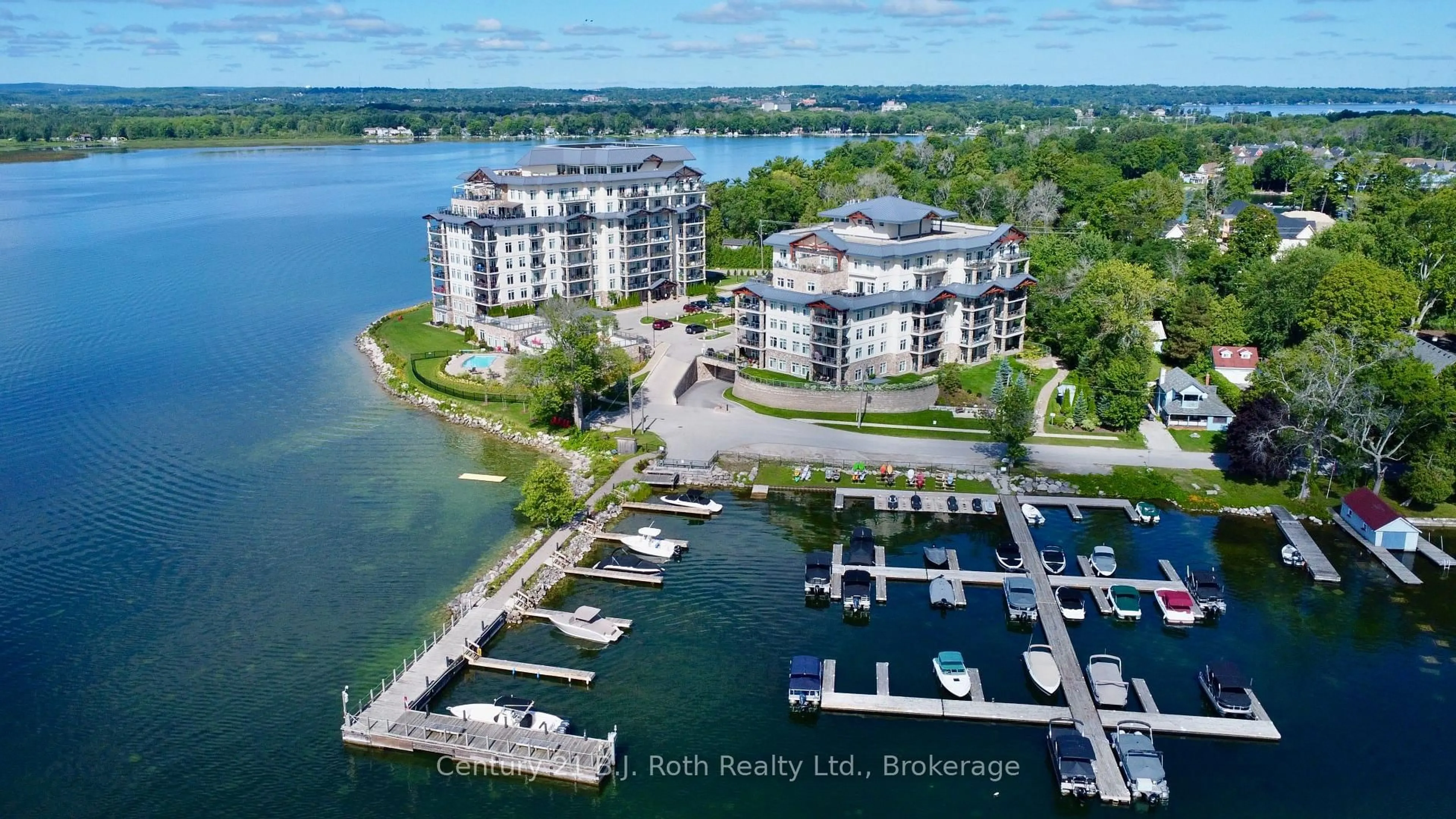 A pic from outside/outdoor area/front of a property/back of a property/a pic from drone, water/lake/river/ocean view for 90 Orchard Point Rd #LS04, Orillia Ontario L3V 8K4