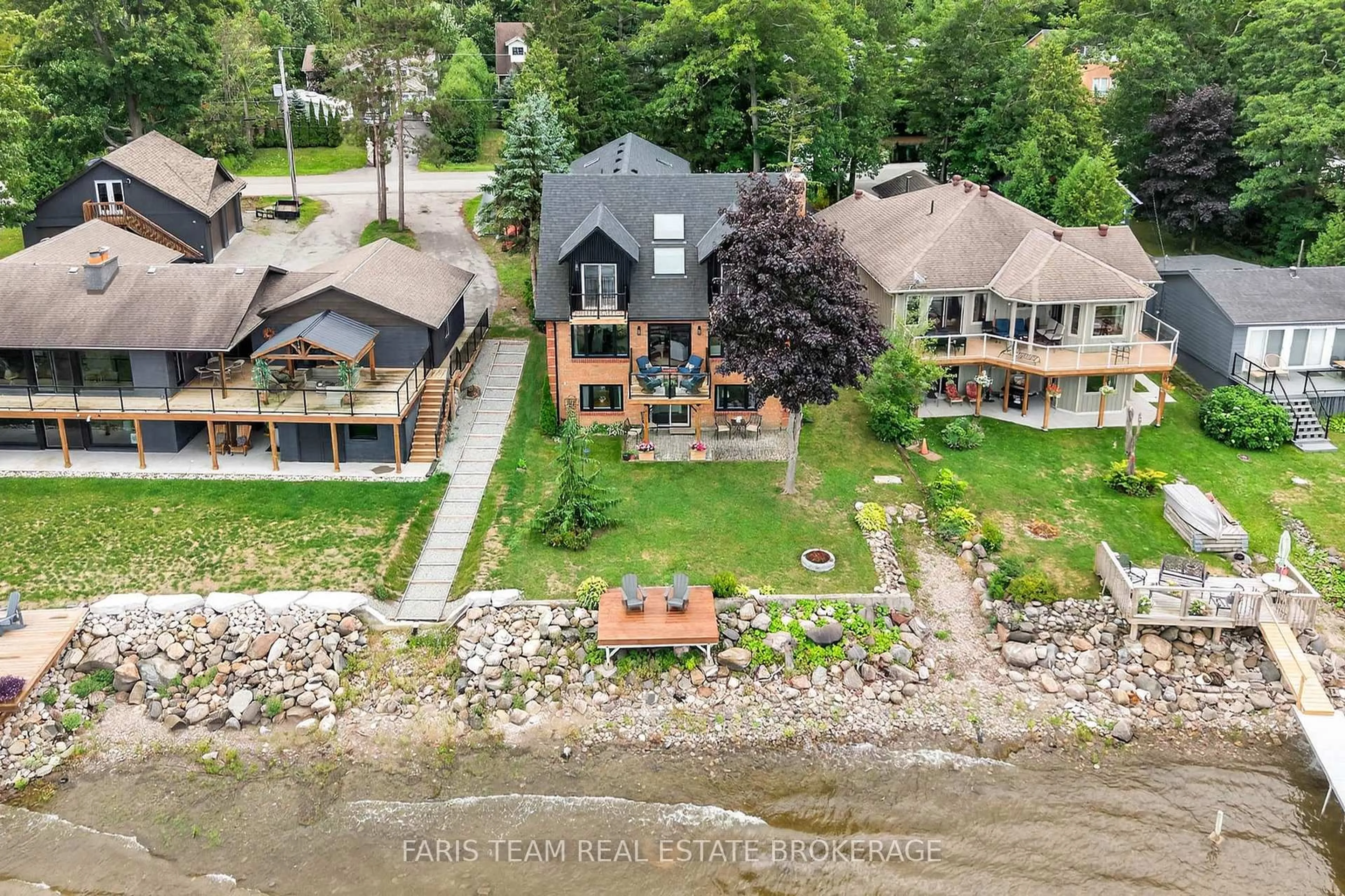 A pic from outside/outdoor area/front of a property/back of a property/a pic from drone, water/lake/river/ocean view for 238 Robins Point Rd, Tay Ontario L0K 2A0