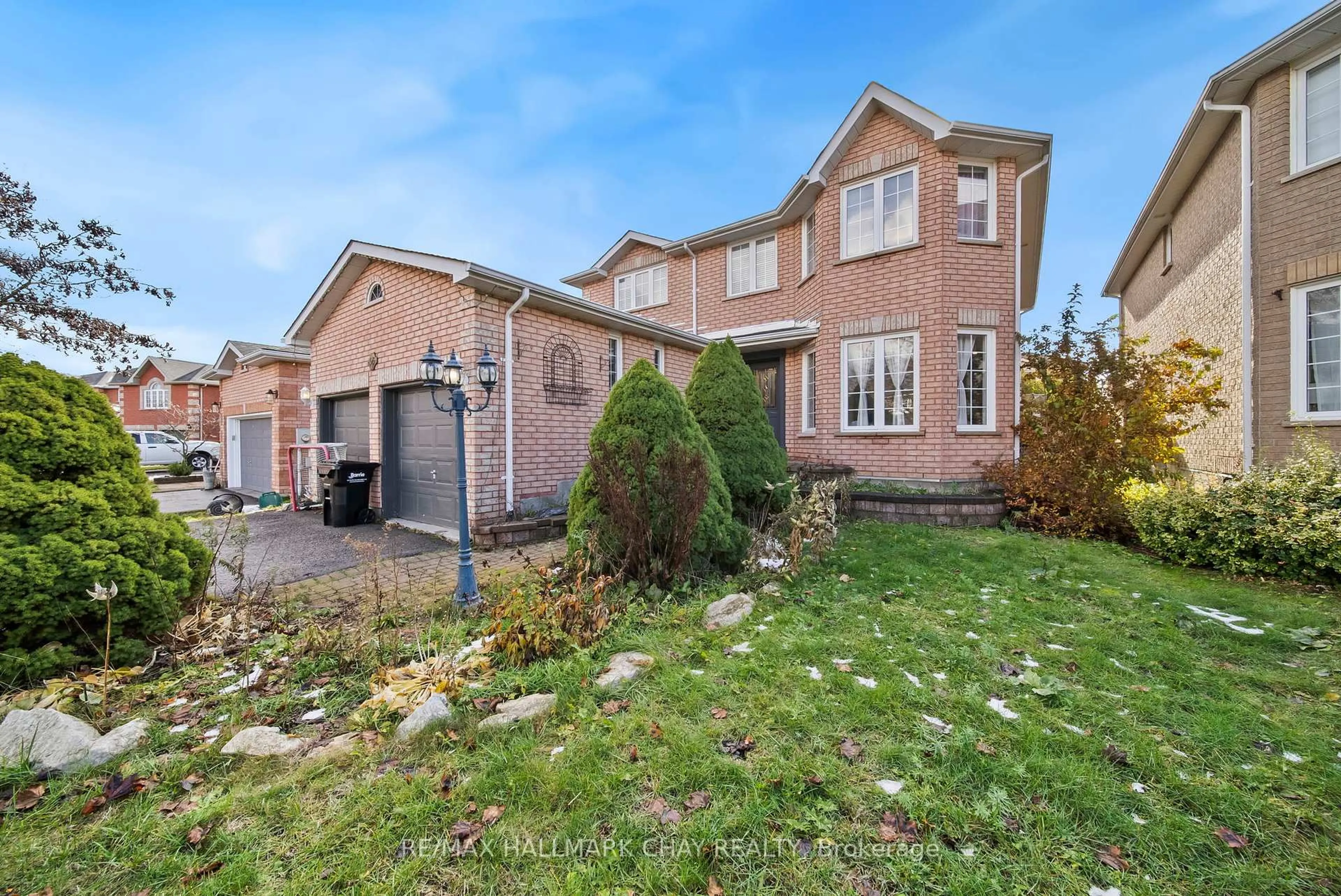 Home with brick exterior material, street for 56 Hubbert Cres, Barrie Ontario L4N 9M4