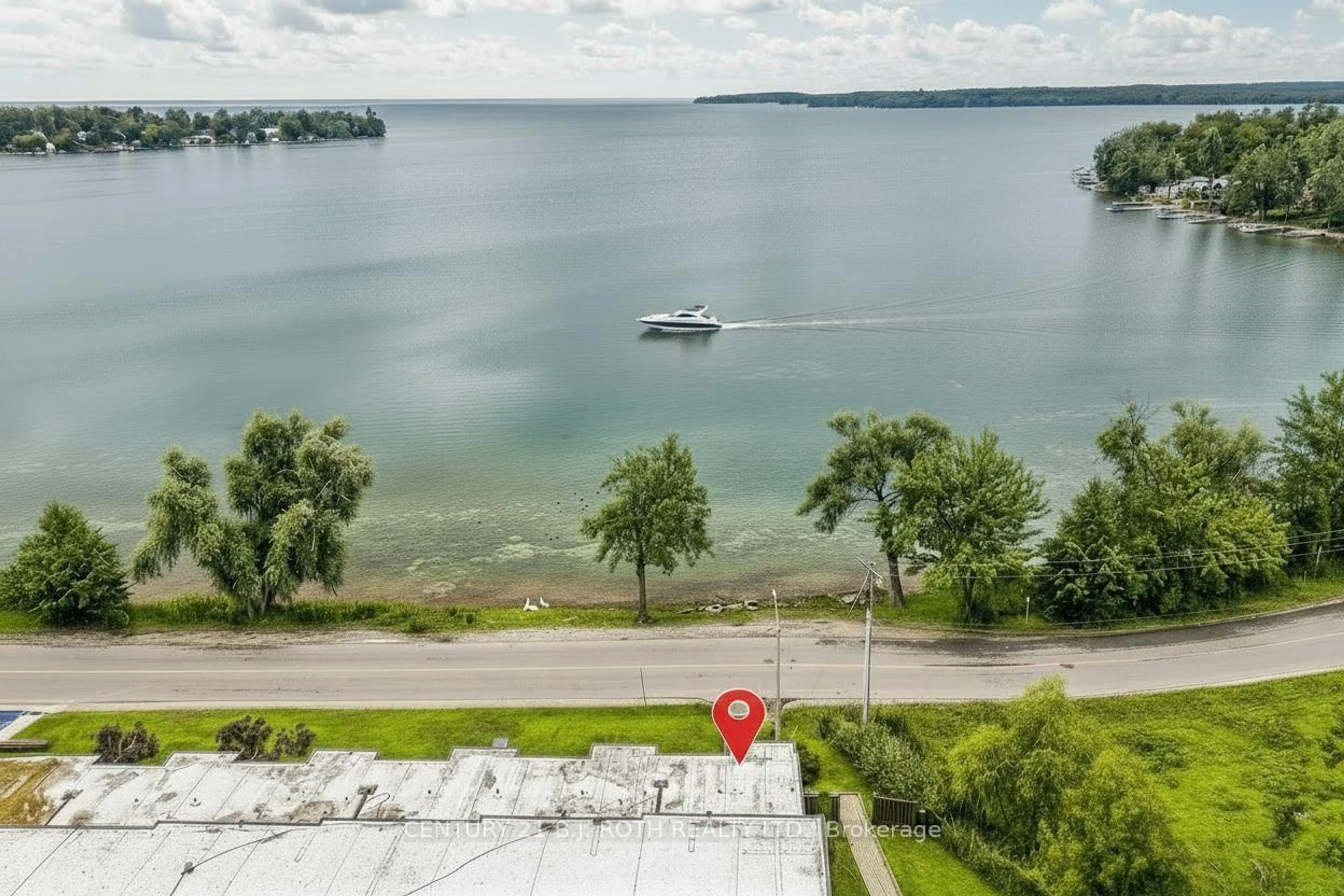A pic from outside/outdoor area/front of a property/back of a property/a pic from drone, water/lake/river/ocean view for 40 VICTORIA Cres #15, Orillia Ontario L3V 6N6