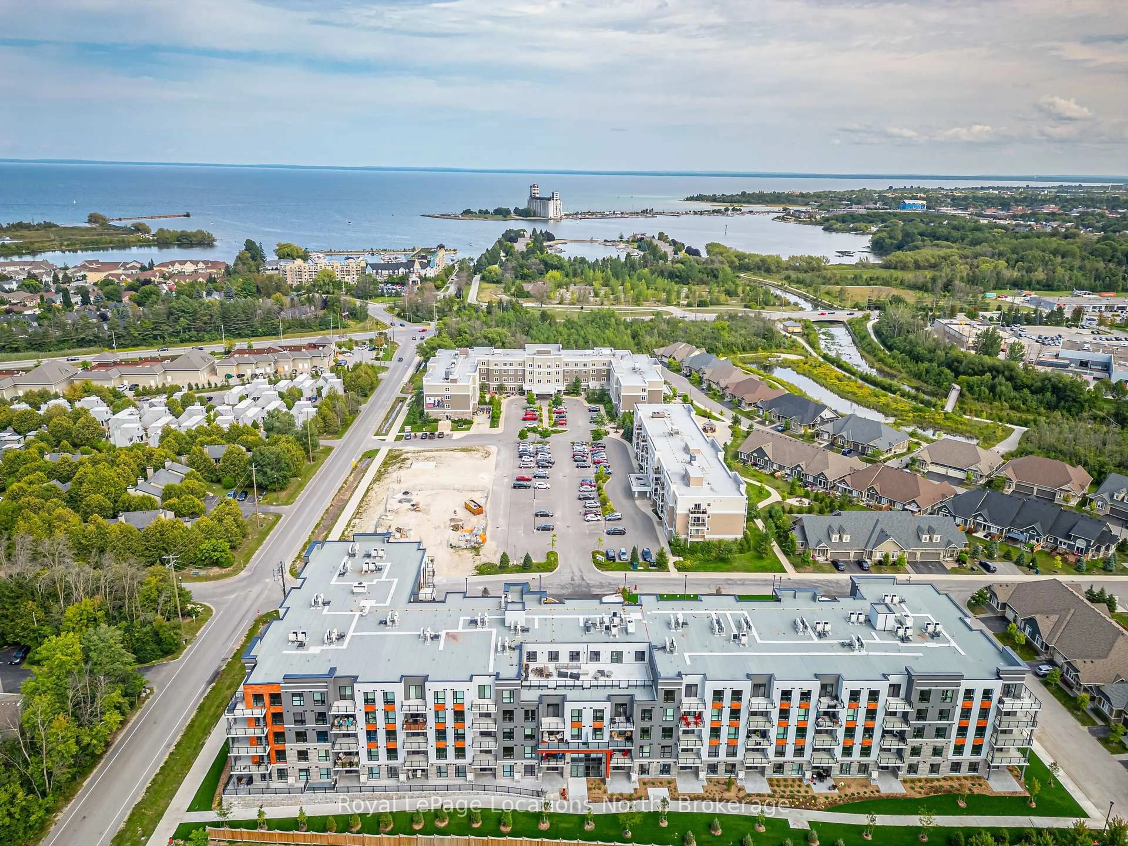 A pic from outside/outdoor area/front of a property/back of a property/a pic from drone, water/lake/river/ocean view for 4 Kimberly Lane #509, Collingwood Ontario L9Y 5B4