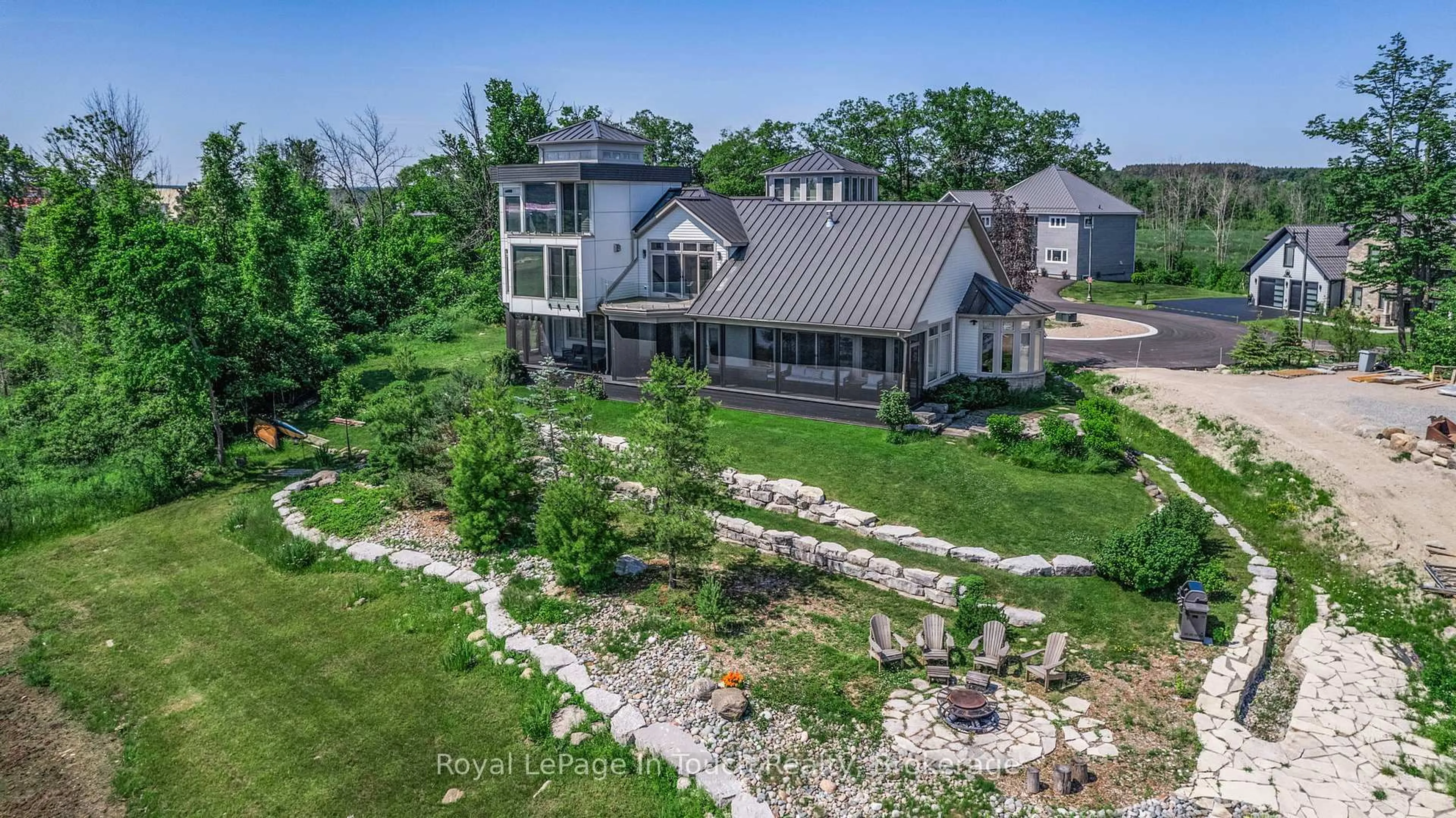 A pic from outside/outdoor area/front of a property/back of a property/a pic from drone, water/lake/river/ocean view for 17 Swan Lane, Tay Ontario L0K 1R0