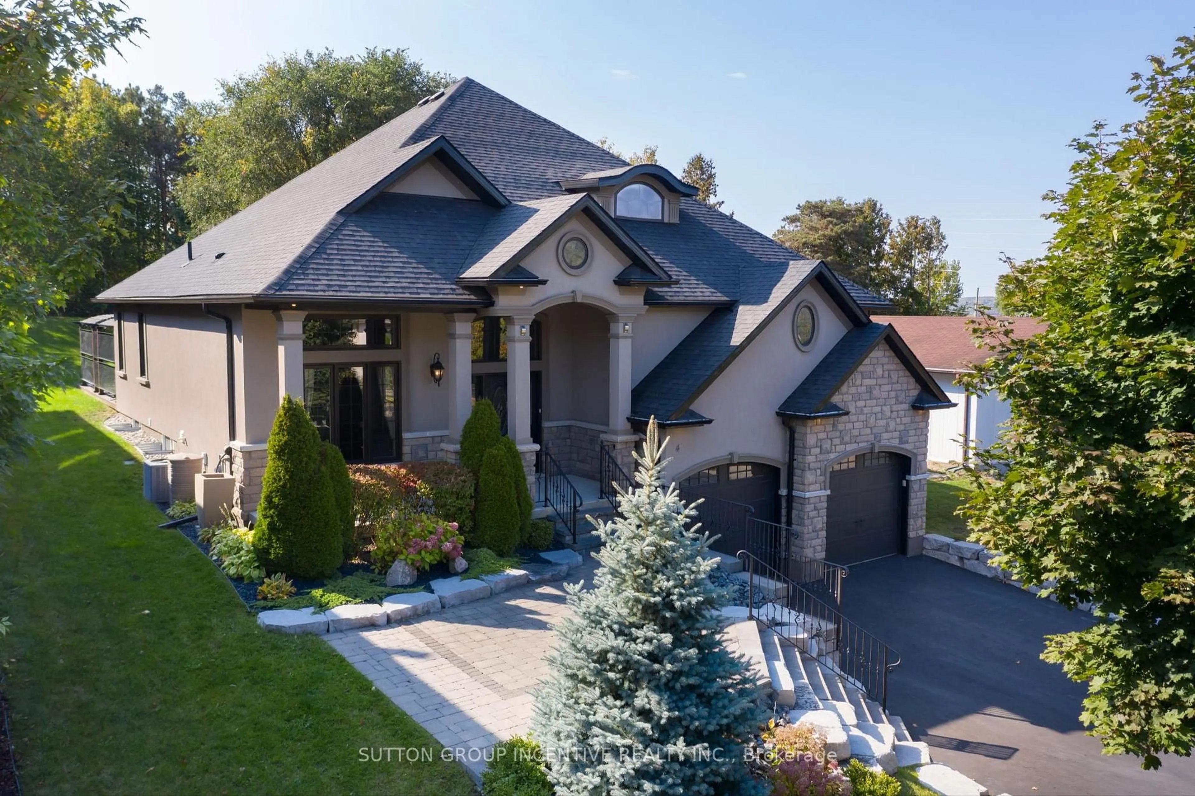 Home with brick exterior material, street for 4 Snowshoe Tr, Barrie Ontario L4N 7Z1