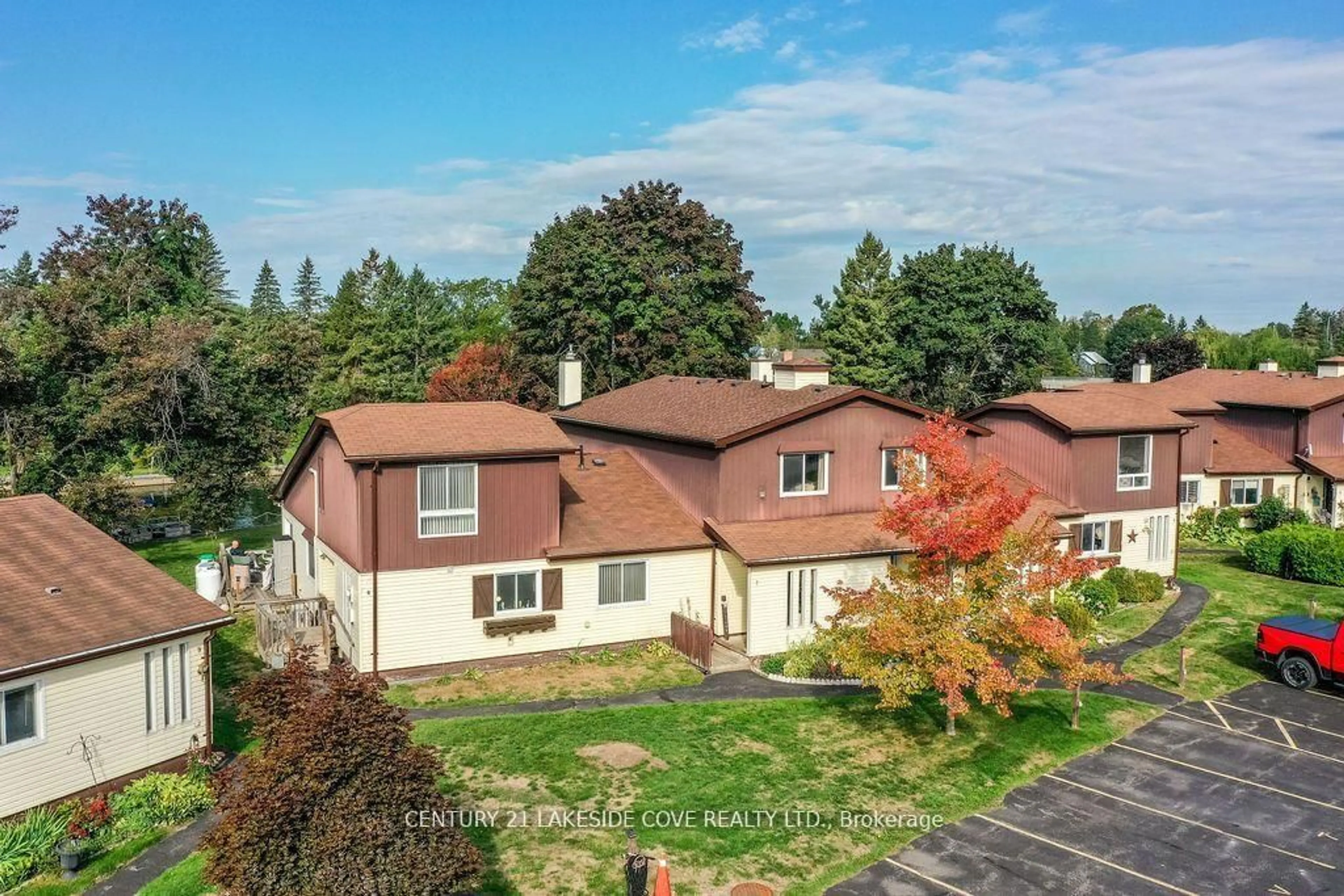 A pic from outside/outdoor area/front of a property/back of a property/a pic from drone, unknown for 70 Laguna Pkwy #Unit #7, Ramara Ontario L0K 1B0