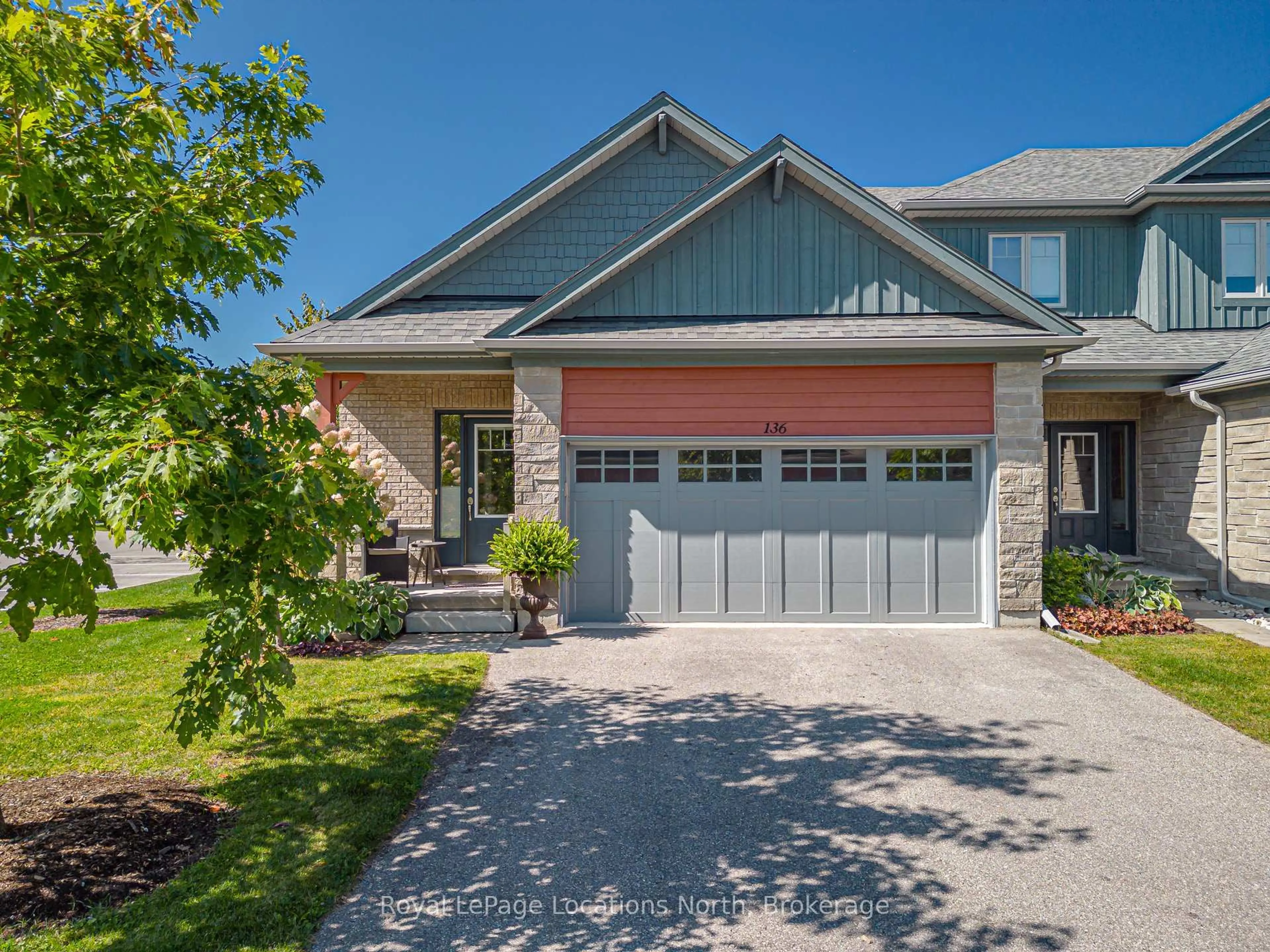 Home with brick exterior material, street for 136 Conservation Way, Collingwood Ontario L9Y 0G9