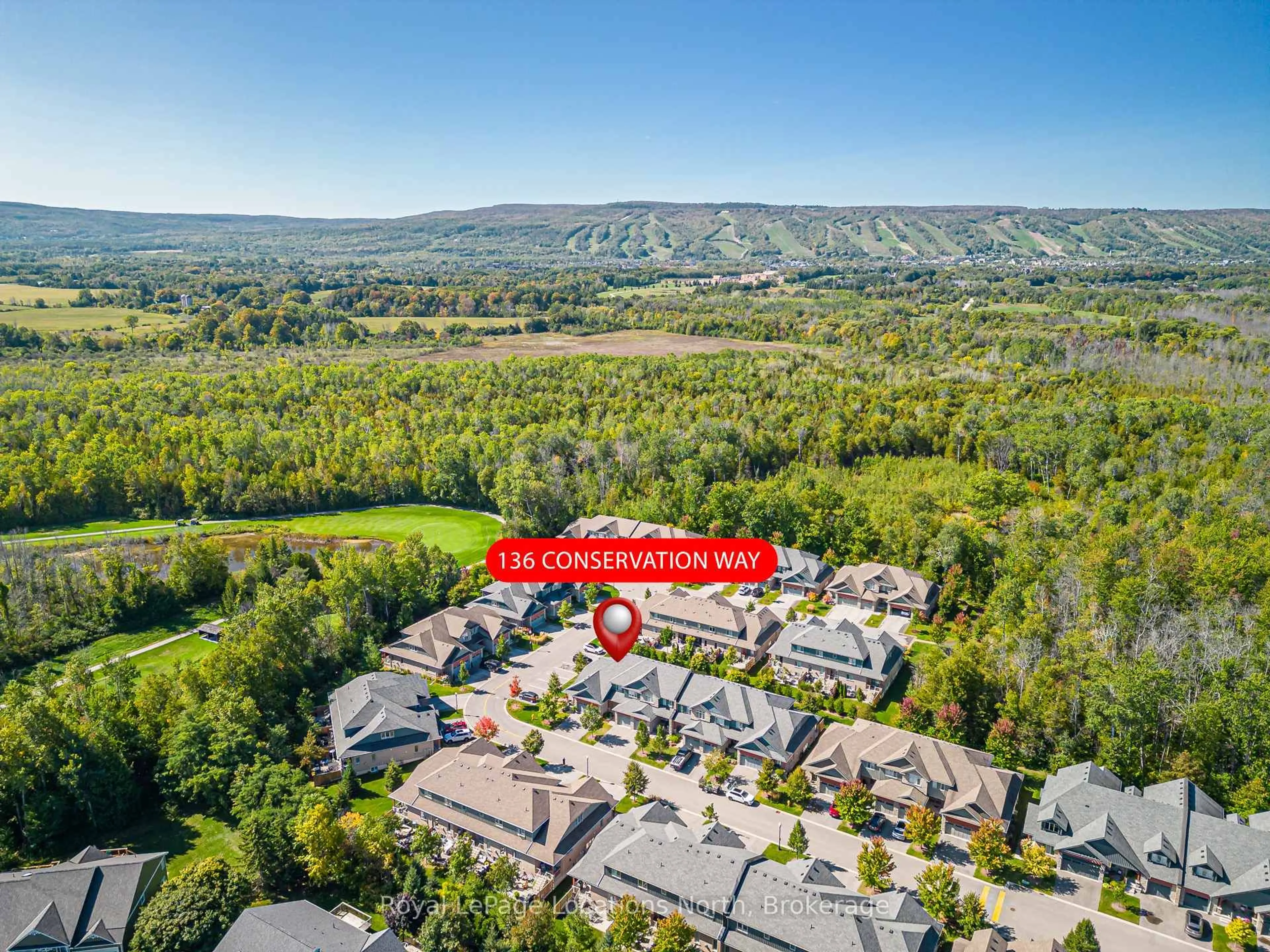 A pic from outside/outdoor area/front of a property/back of a property/a pic from drone, mountain view for 136 Conservation Way, Collingwood Ontario L9Y 0G9