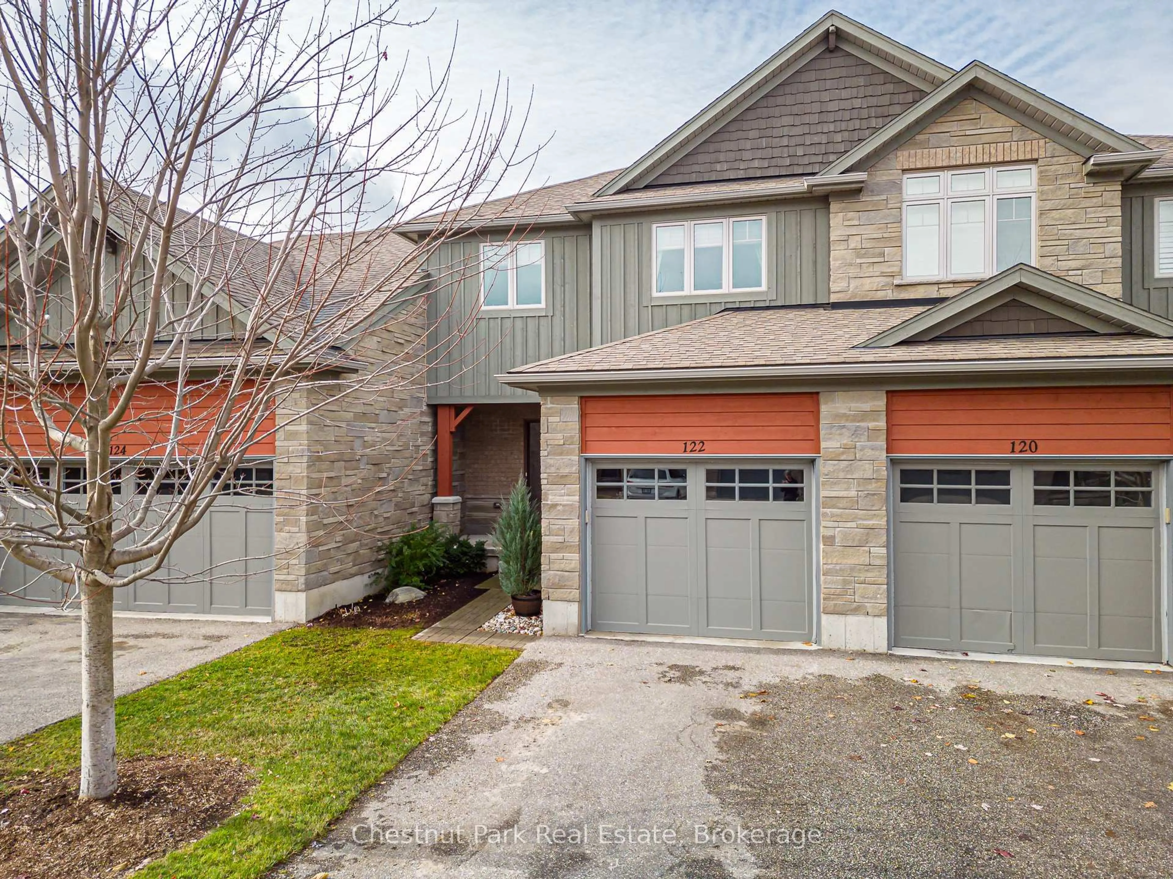 Home with brick exterior material, street for 122 Conservation Way, Collingwood Ontario L9Y 0G9