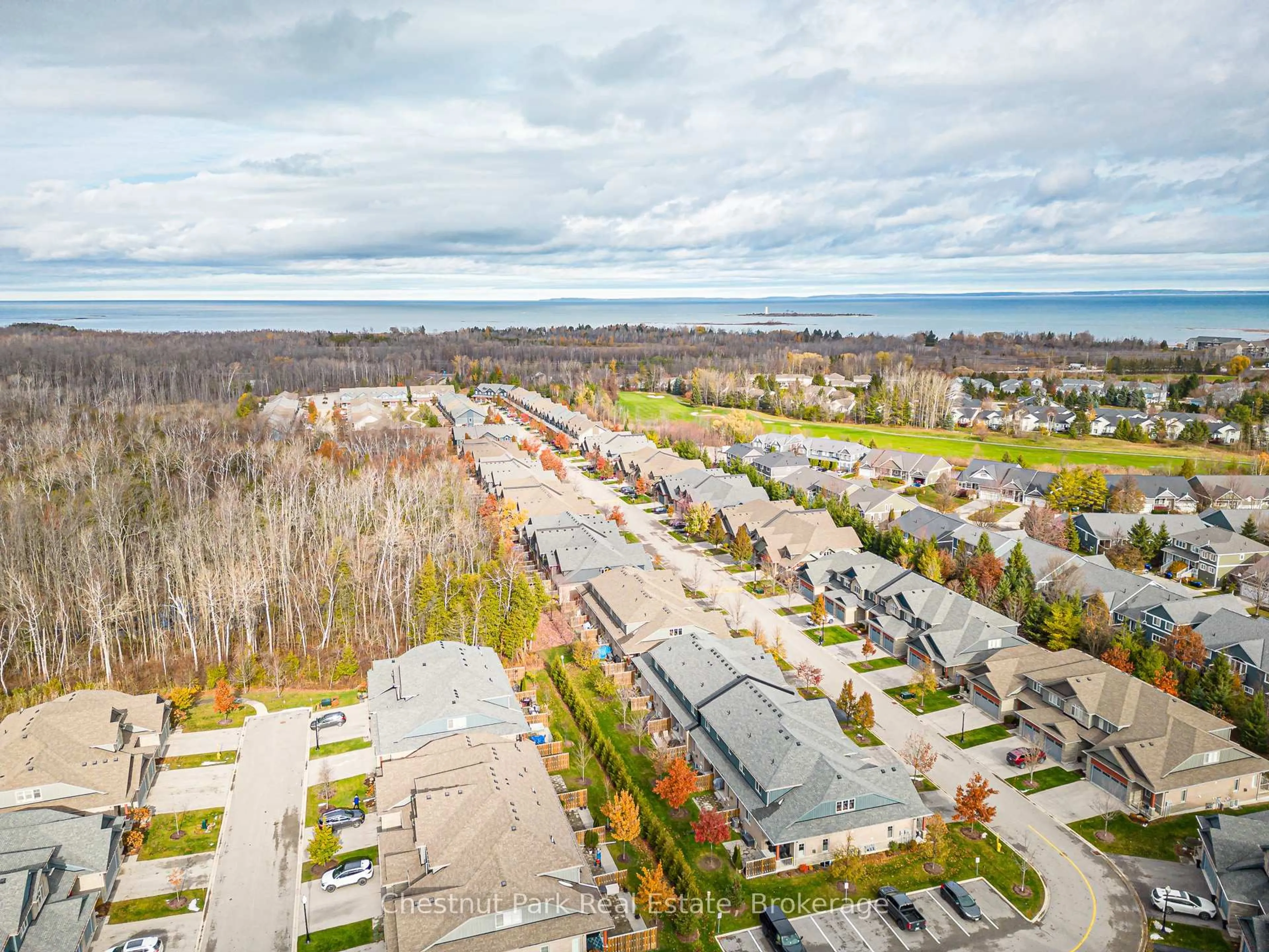 A pic from outside/outdoor area/front of a property/back of a property/a pic from drone, street for 122 Conservation Way, Collingwood Ontario L9Y 0G9