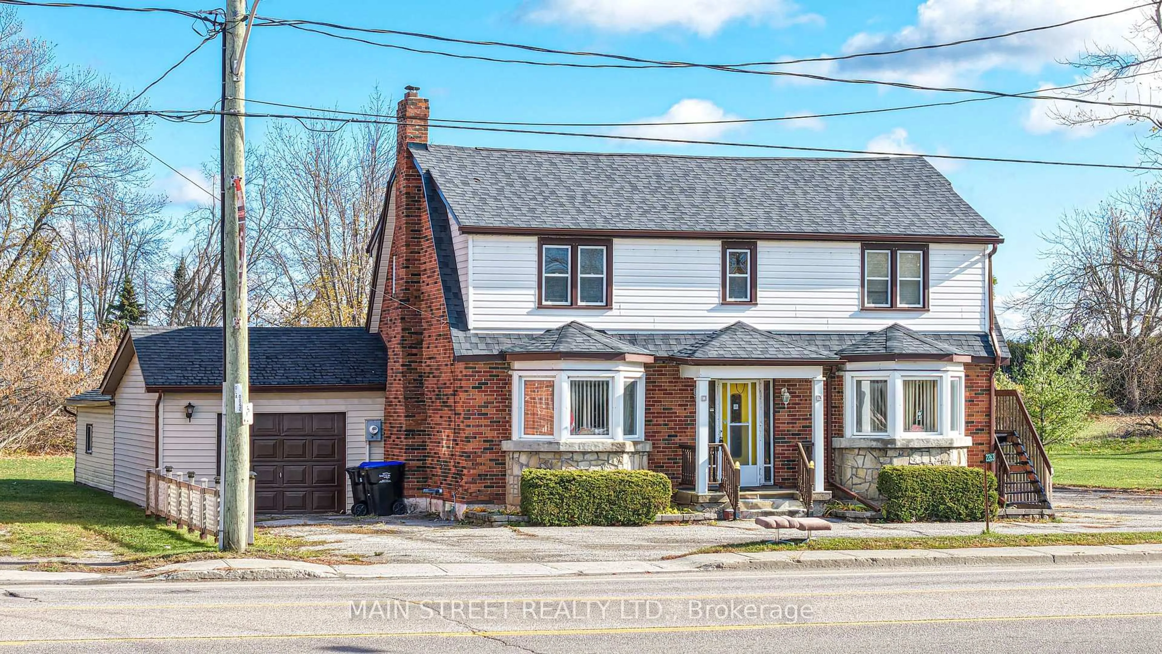 Home with brick exterior material, street for 2263 Hwy 12 Highway, Ramara Ontario L0K 1B0