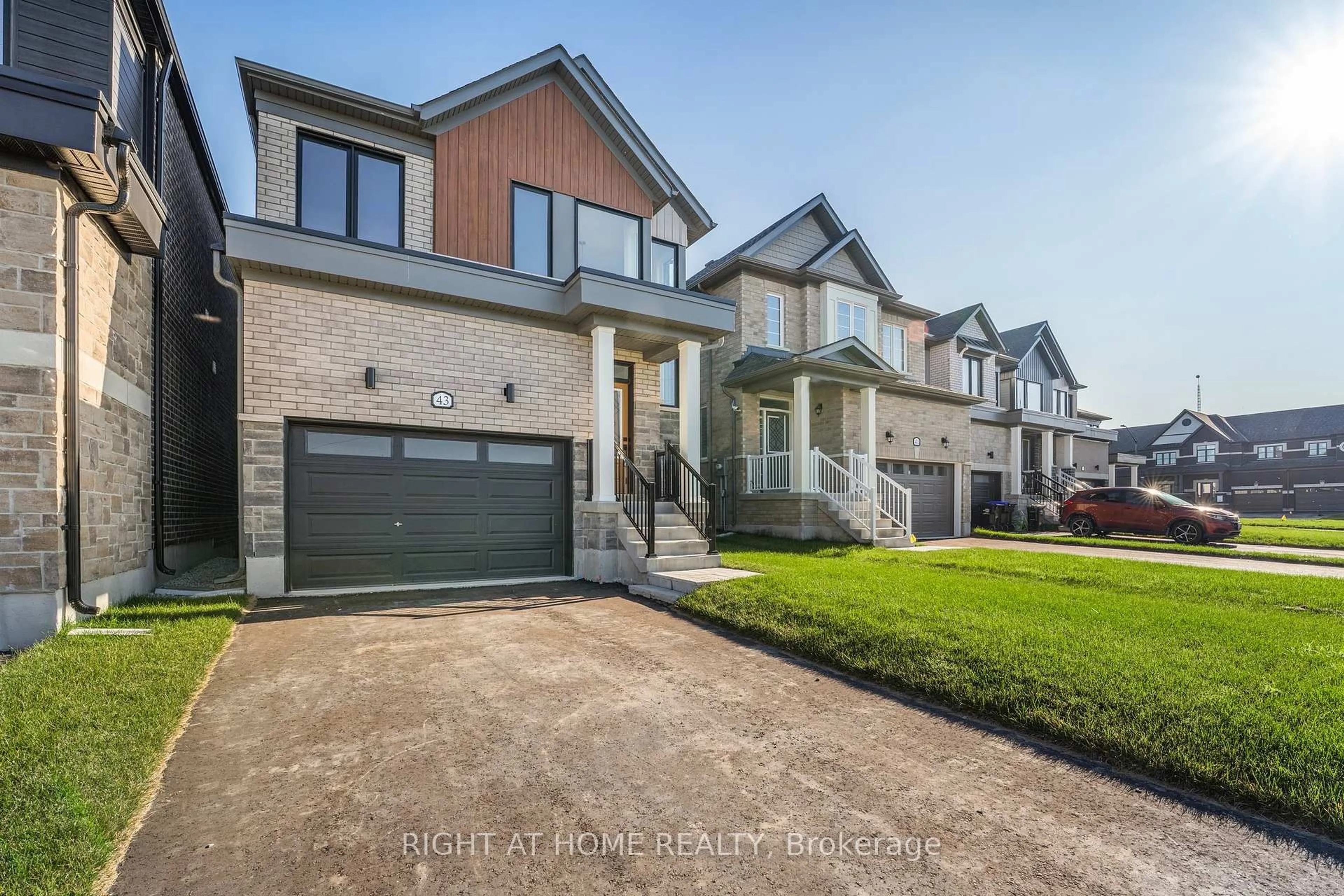 Home with brick exterior material, street for 43 Federica Cres, Wasaga Beach Ontario L9Z 0N5
