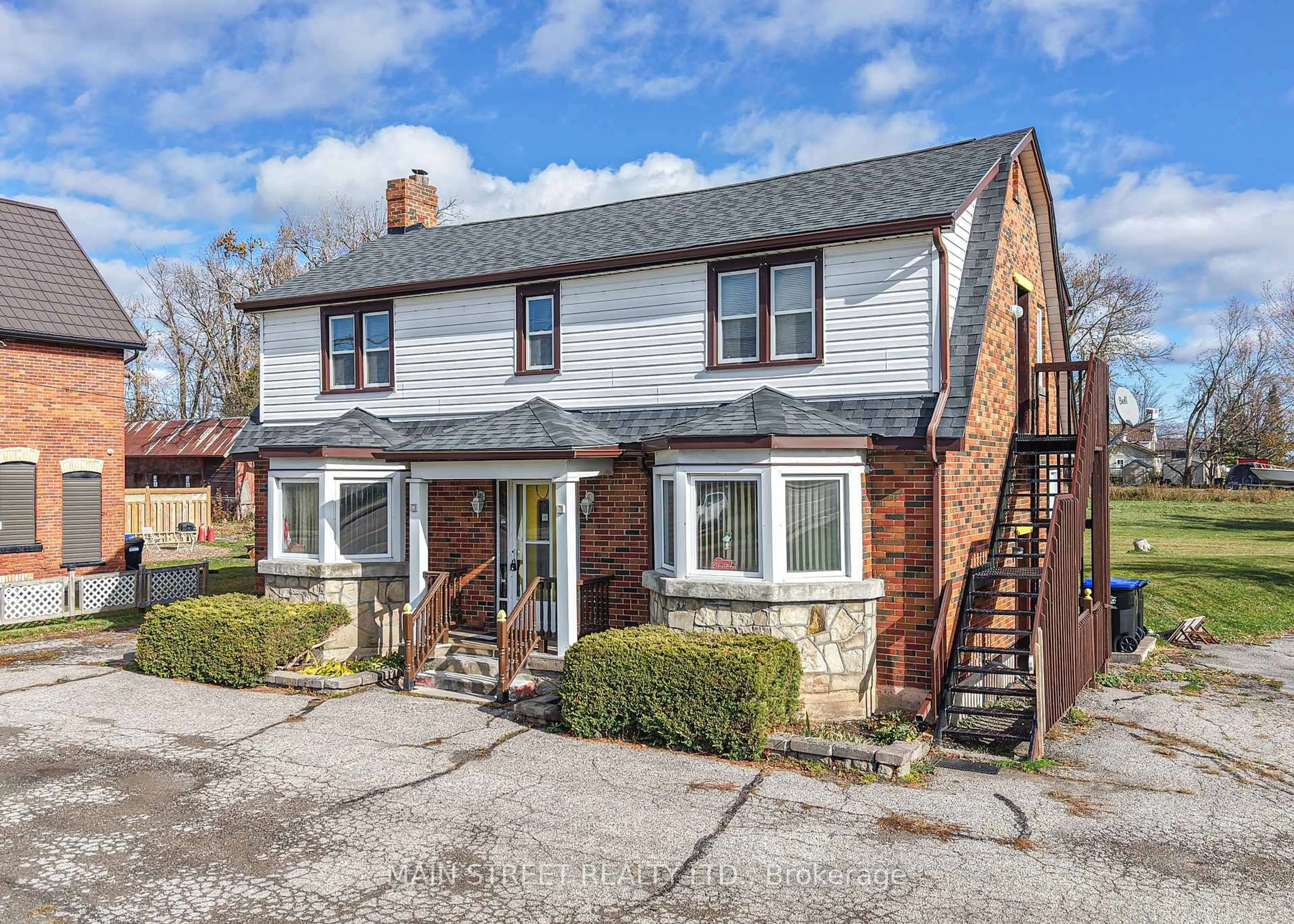 Home with brick exterior material, street for 2263 Hwy 12 Highway, Ramara Ontario L0K 1B0