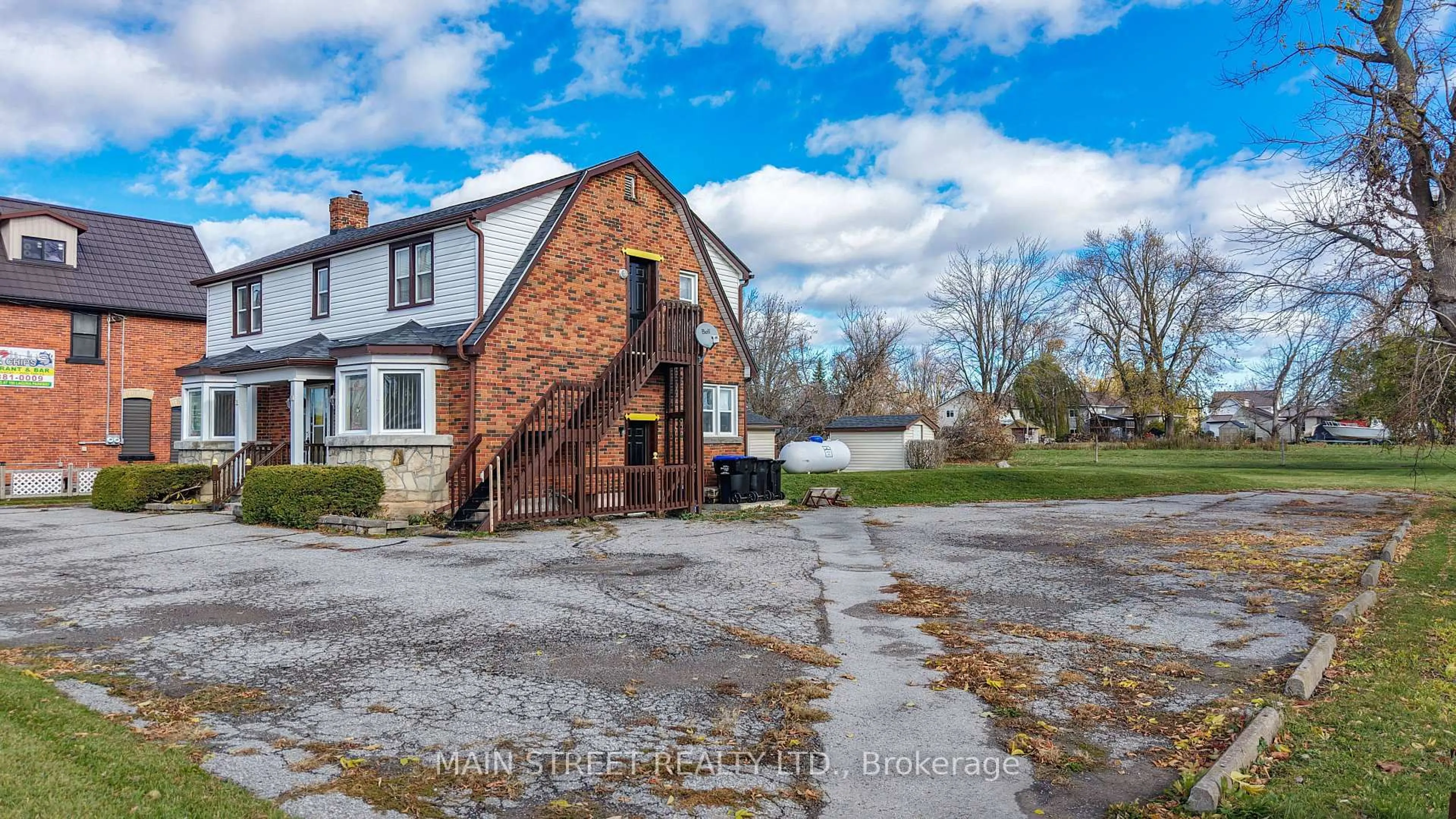 A pic from outside/outdoor area/front of a property/back of a property/a pic from drone, street for 2263 Hwy 12 Highway, Ramara Ontario L0K 1B0