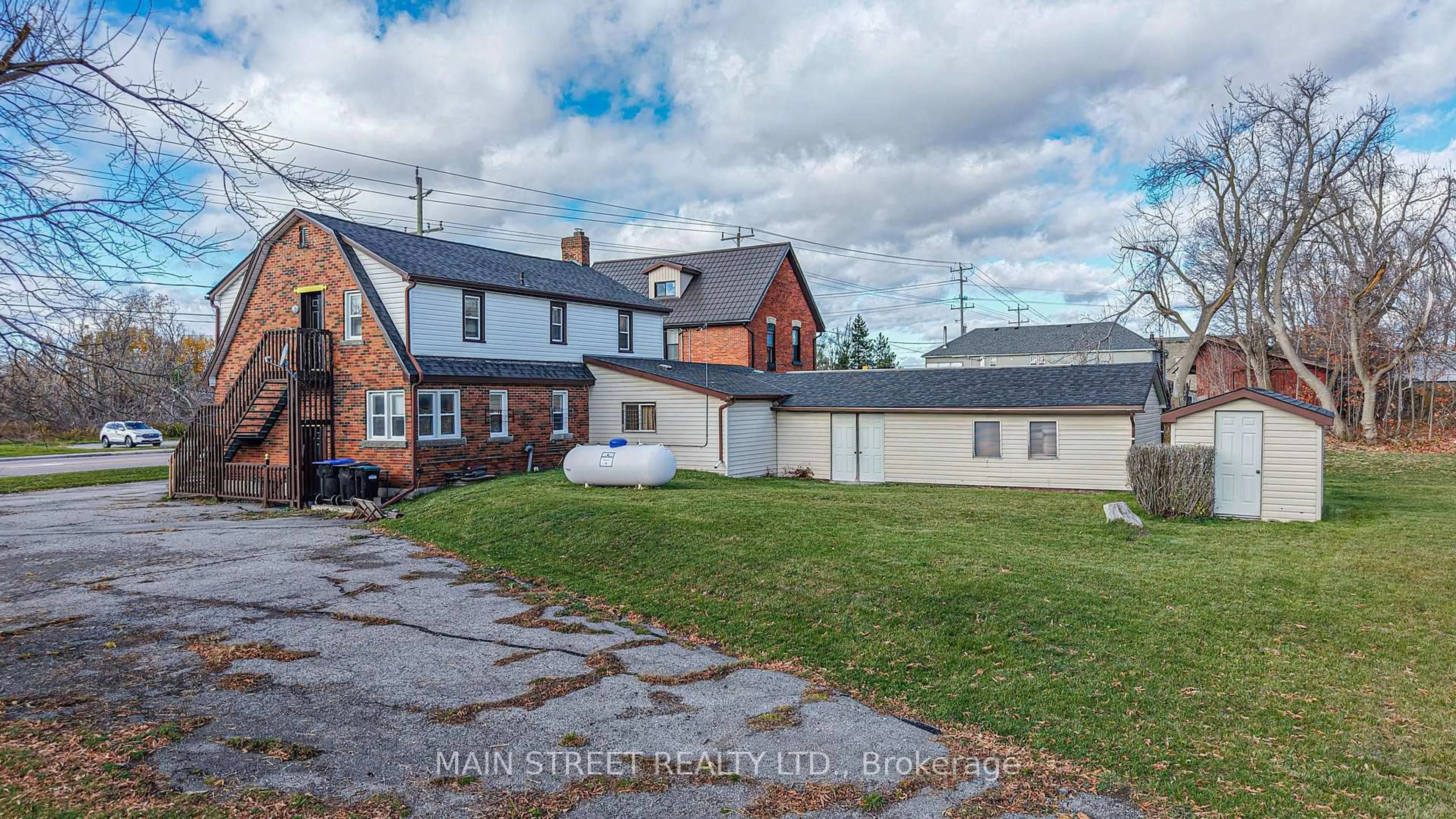 A pic from outside/outdoor area/front of a property/back of a property/a pic from drone, street for 2263 Hwy 12 Highway, Ramara Ontario L0K 1B0