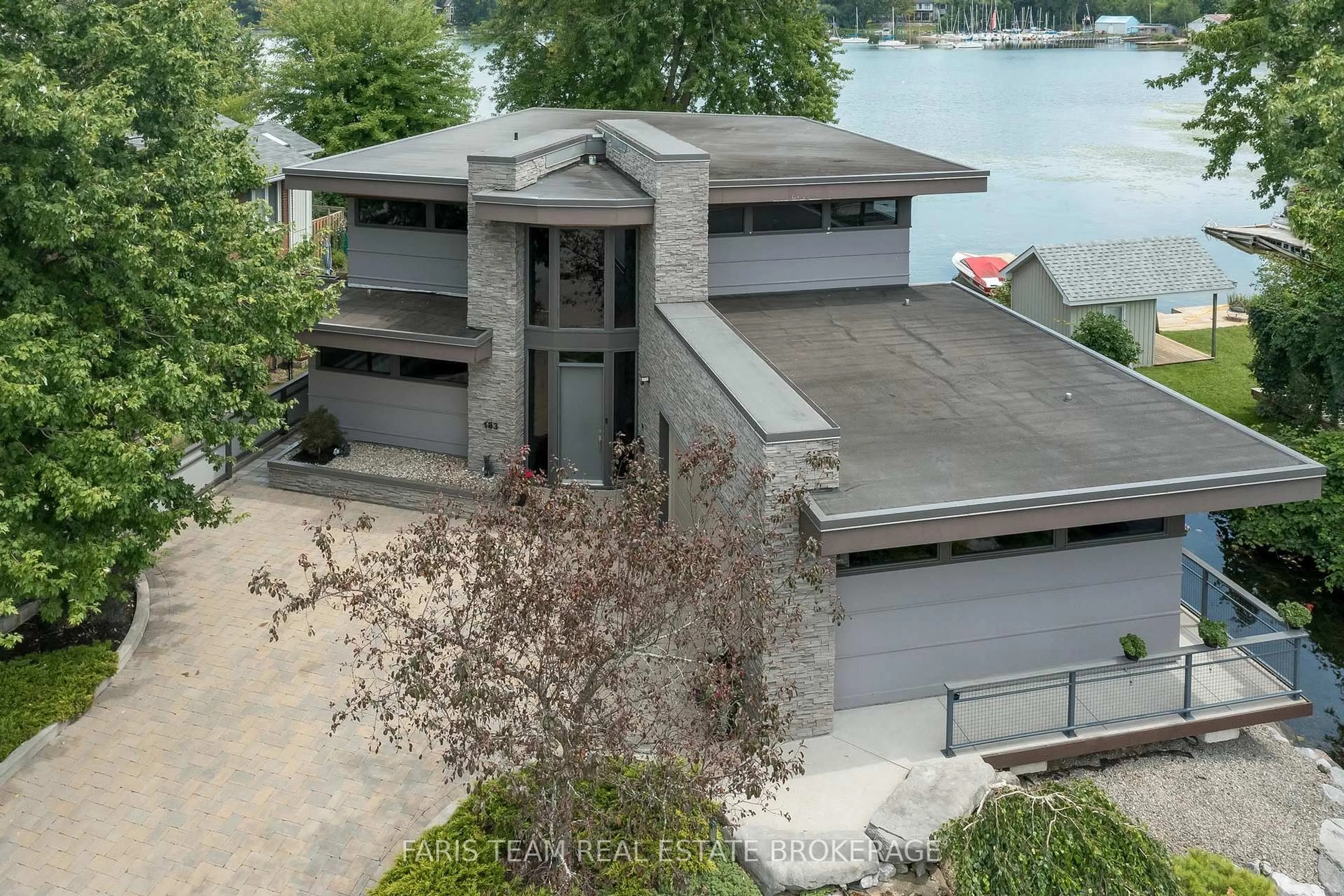 A pic from outside/outdoor area/front of a property/back of a property/a pic from drone, water/lake/river/ocean view for 183 Cedar Island Rd, Orillia Ontario L3V 1T2