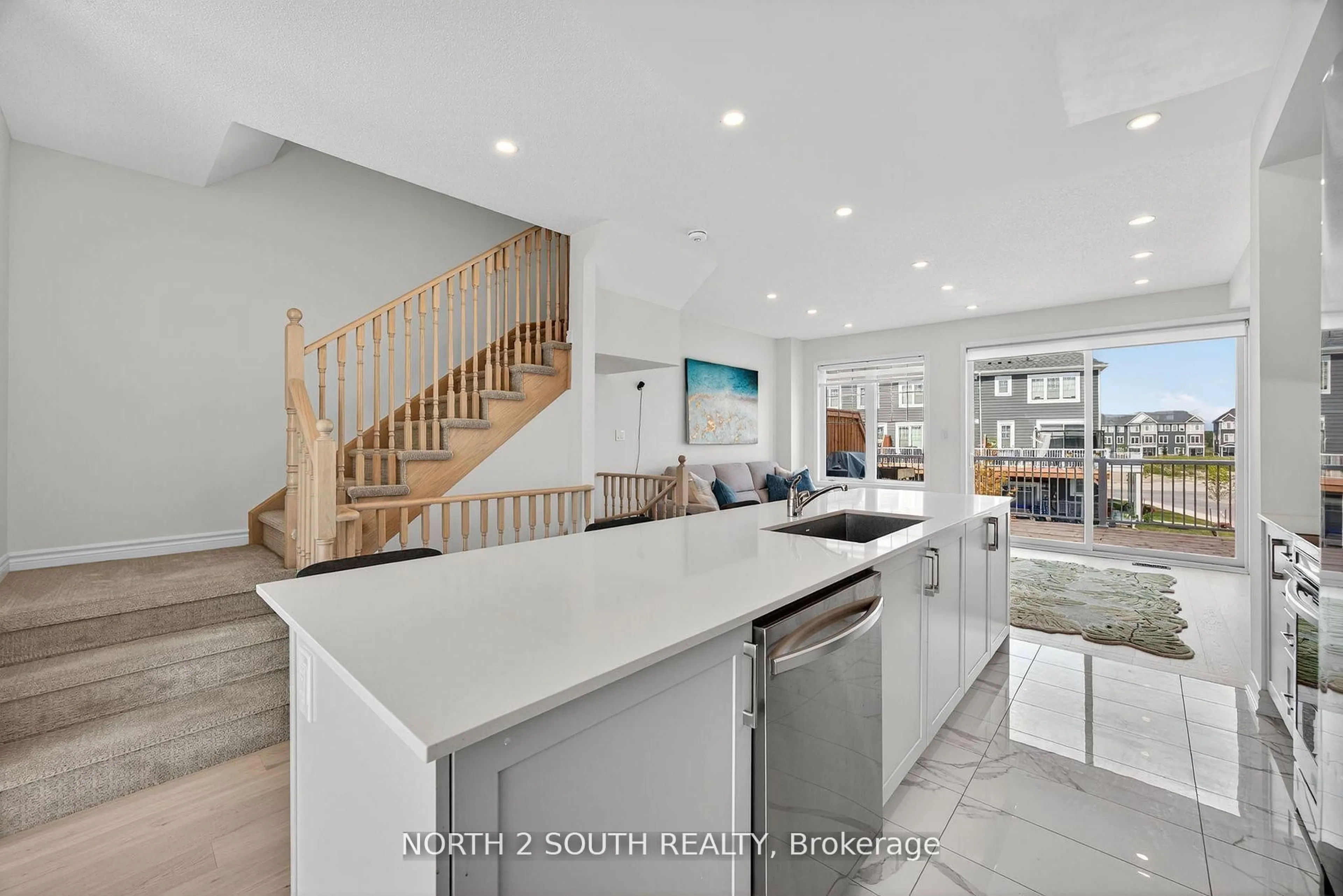 Open concept kitchen, unknown for 24 Abby Dr, Wasaga Beach Ontario L9Z 0K2