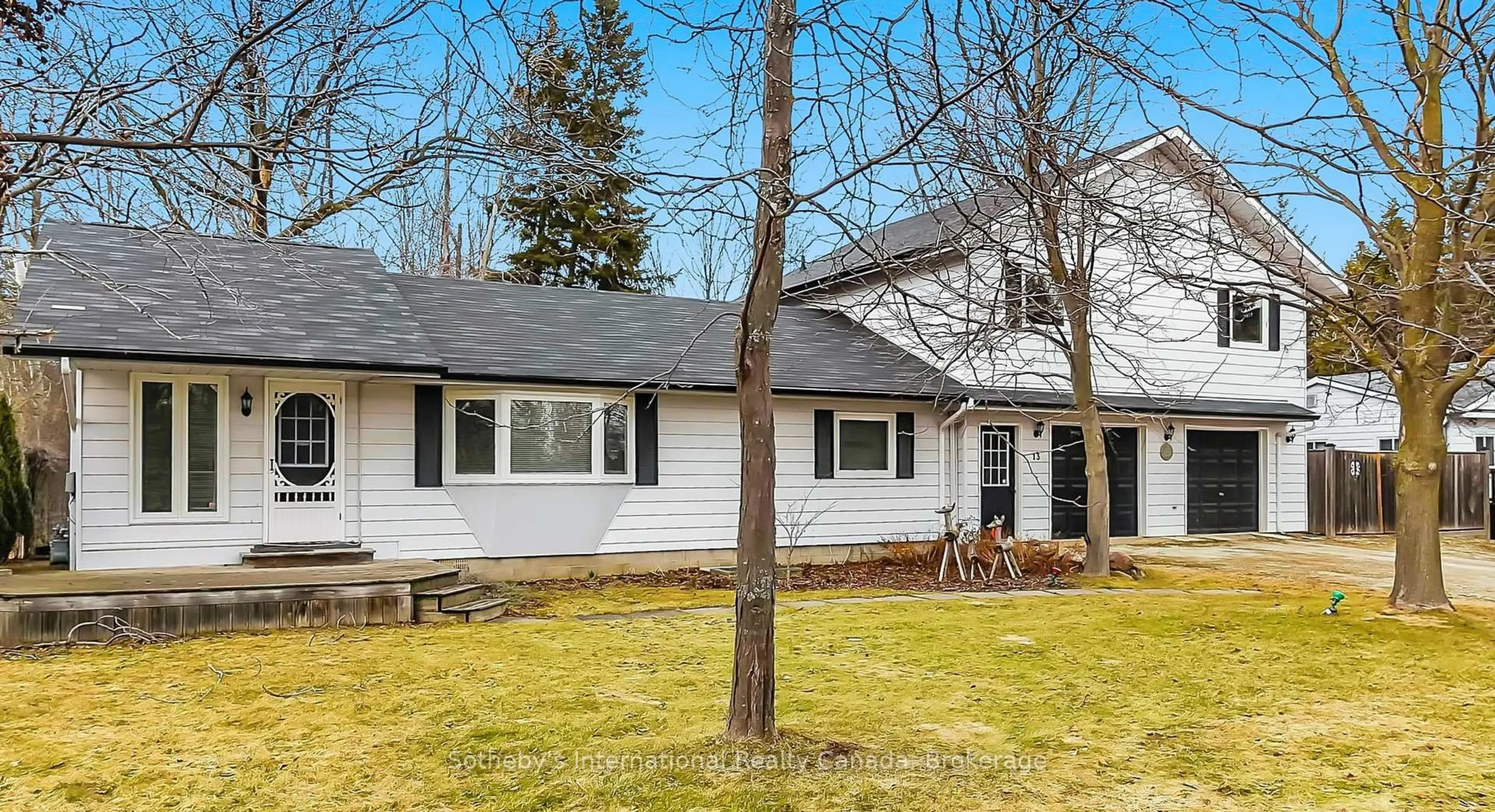 Home with vinyl exterior material, street for 13 Belcher St, Collingwood Ontario L9Y 3Z1