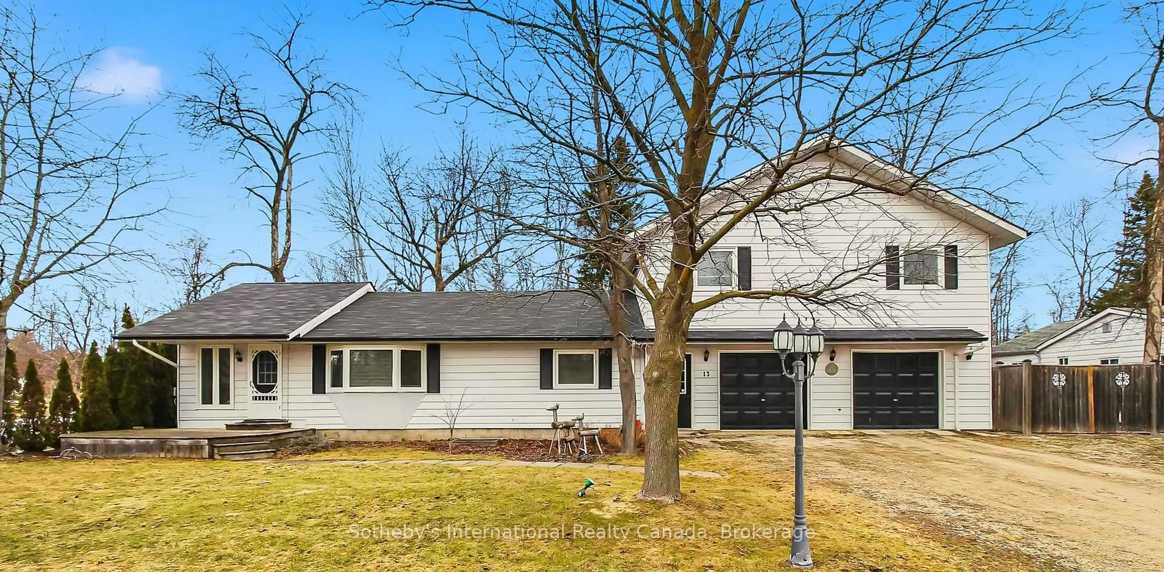 Home with vinyl exterior material, street for 13 Belcher St, Collingwood Ontario L9Y 3Z1