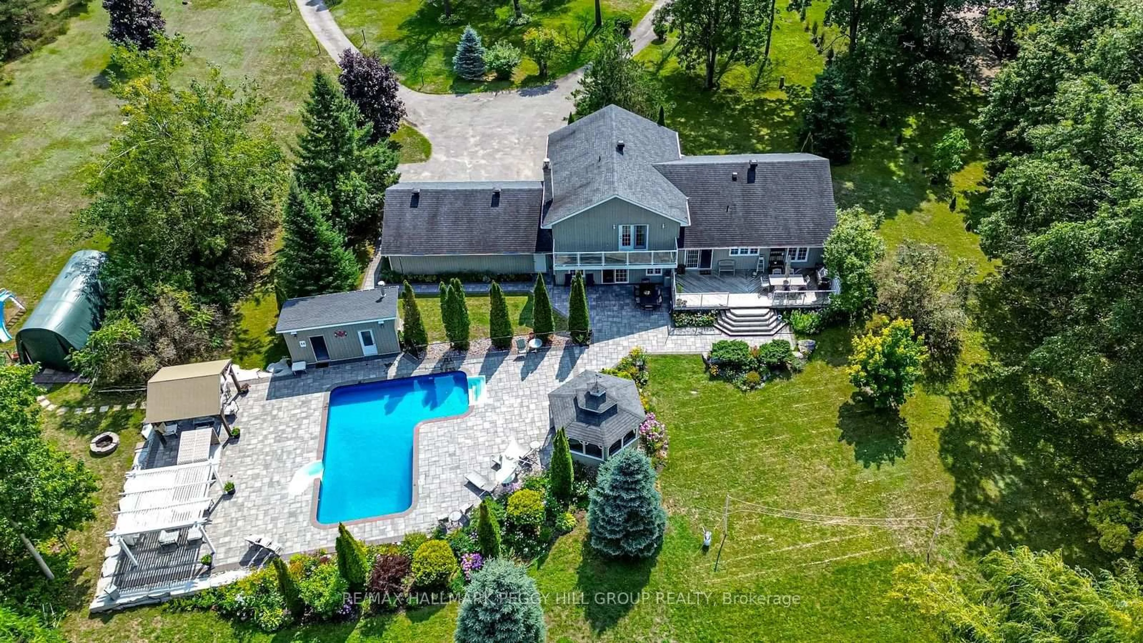 A pic from outside/outdoor area/front of a property/back of a property/a pic from drone, unknown for 2 Mills Circ, Springwater Ontario L9X 0J7