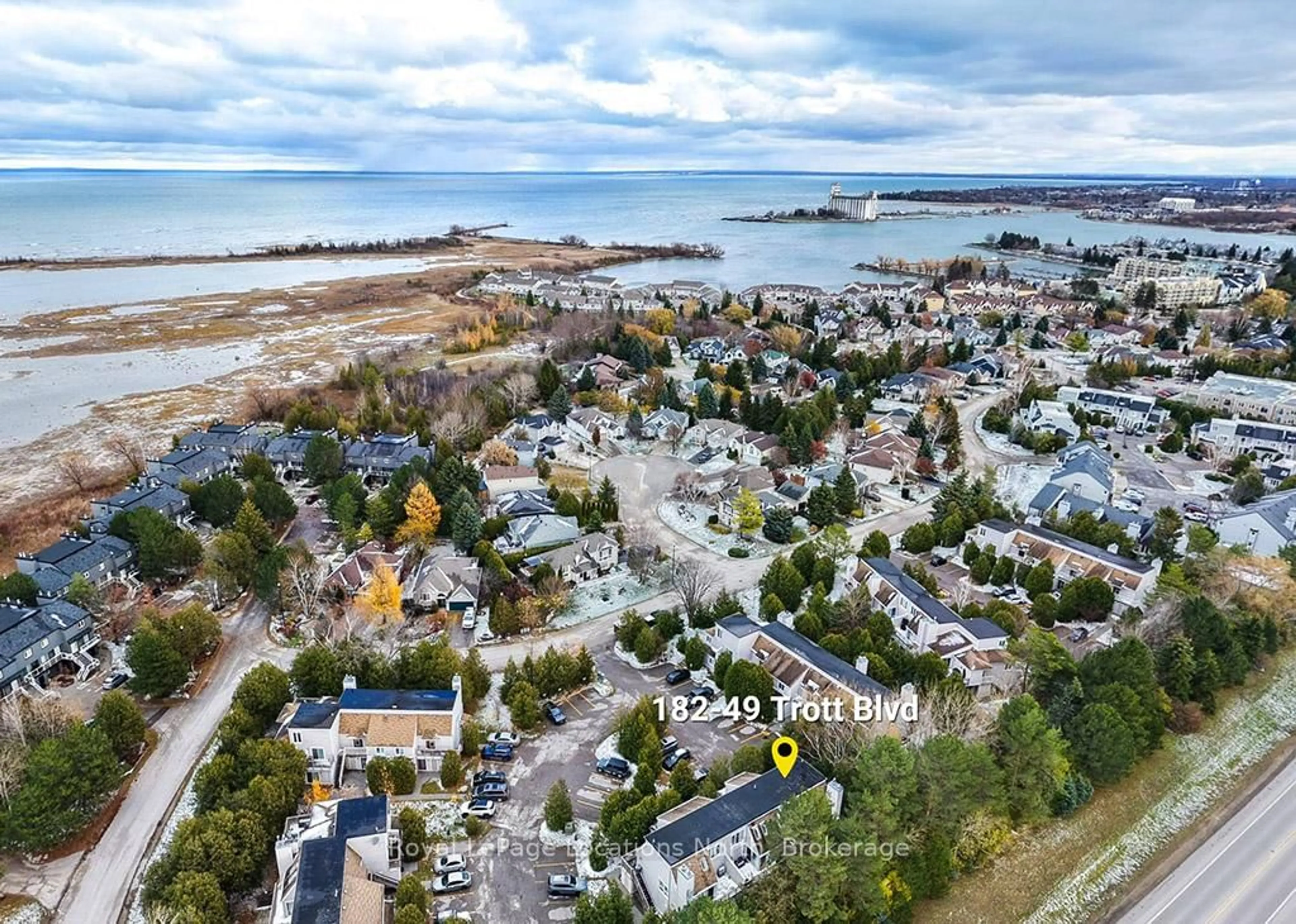 A pic from outside/outdoor area/front of a property/back of a property/a pic from drone, water/lake/river/ocean view for 49 Trott Blvd #182, Collingwood Ontario L9Y 5B8