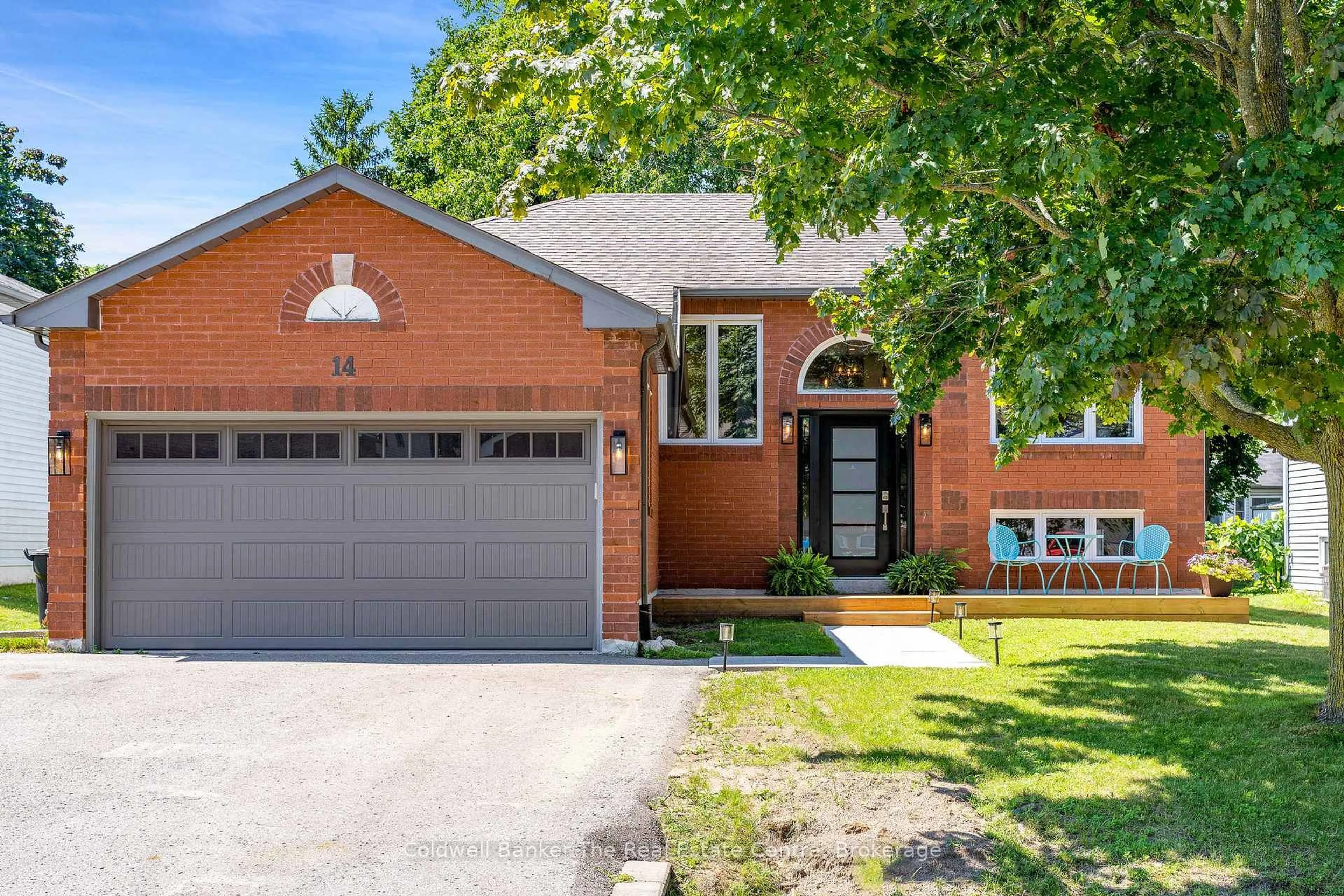 Home with brick exterior material, street for 14 Langevin Dr, Wasaga Beach Ontario L9Z 1C6