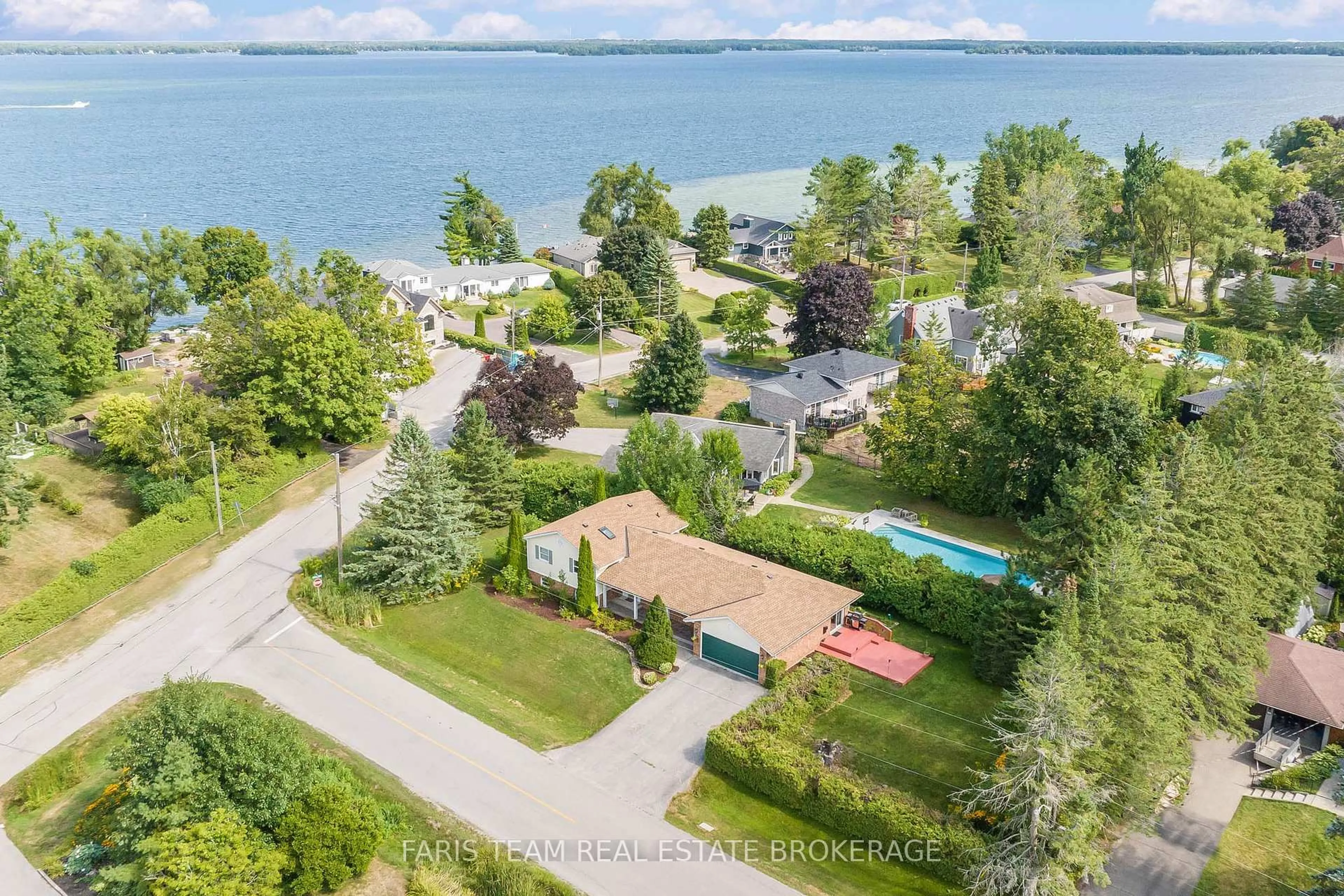 A pic from outside/outdoor area/front of a property/back of a property/a pic from drone, water/lake/river/ocean view for 53 Maple Dr, Orillia Ontario L3V 3W5